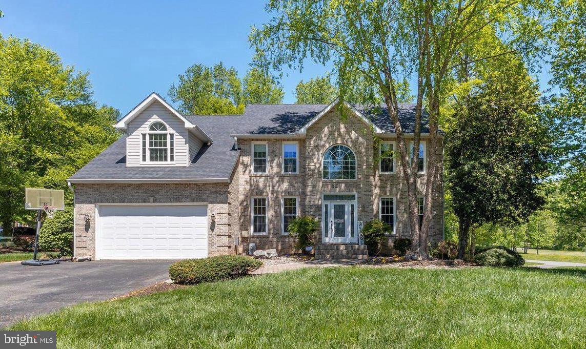 Open house this evening, September 19th from 5pm to 7pm. All agents and buyers, please stop on by to see this beautiful home! Welcome to 1800 Greer Court, a truly exceptional residence tucked away in Gambrills, Maryland with a 1.24 acre lot with a combined total finished sq ft of @ 5,940 with a @500 sq ft storage room under the solarium! This expansive home stands out for its custom craftsmanship, beautifully appointed details, & elegant upgrades, offering a level of sophistication rarely found in today's market. This property provides an ideal blend of privacy, space, & luxury, with thoughtful details at every turn. With 6 spacious bedrooms, (one on the main level) 3 full & 1 half baths, this home delivers both comfort & style, in abundance. The moment you arrive, you are greeted by a large driveway with charming curb appeal, leading you to the entrance of this stunning residence. Step inside to discover wide plank hardwood floors that flow seamlessly throughout. The deluxe kitchen is a true chef's dream, equipped with top-of-the-line features that elevate your cooking experience. Highlights include a built in microwave, wall oven, with a warming oven, a built in slow cooker under the wall oven, a pot filler over the 6 burner propane gas stove that is also a hibachi station (with the attachments), a steamer built right into the expansive kitchen island, three built in dishwashers & a separate ice maker located in the butler's pantry. Every detail has been considered to make daily living as convenient as it is, luxurious. Whether you're hosting dinner parties or preparing a quiet meal at home, this kitchen has everything you need. The main level features the living room, dining room, family room, a bedroom (being used as an office) the kitchen, a half bath, the bulter's pantry area & the Solarium. The kitchen and family room have speakers in the ceiling so you can listen to music or the tv! The Primary Suite is a peaceful retreat, complete with a skylight in the bathroom that allows natural light to fill the space. The bathroom, itself, is an oasis, offering a large soaking tub, a separate shower, & elegant finishes throughout. The primary closet is an absolute joy to the avid fashionista! Enjoy having your very own, huge Custom built, walk in closet! For added convenience, the home's laundry room is thoughtfully located on the upper level, making it easy to manage household tasks. The finished basement offers a large family room, a walk out level to the backyard, a work out space, a small kitchenette, full bathroom & a room that can be used for guests. The basement could also be used as a full basement apartment or in-law suite! With its combination of modern conveniences and timeless design, 1800 Greer Court is truly a one-of-a-kind property that must be seen to be appreciated. Recent updates include one of the HVAC replaced in 2016 & a New Roof Just installed in April! Septic pumped in March 2025, Well systems serviced May of 2025. Handicap ramp at back of house to be able to enter into the back of the house. Minutes to shopping, restaurants, Fort Meade, BWI, & the MARC train. Seller is offering a one year, HWA home warranty! Make your family dreams come true, call now to schedule your personal showing!