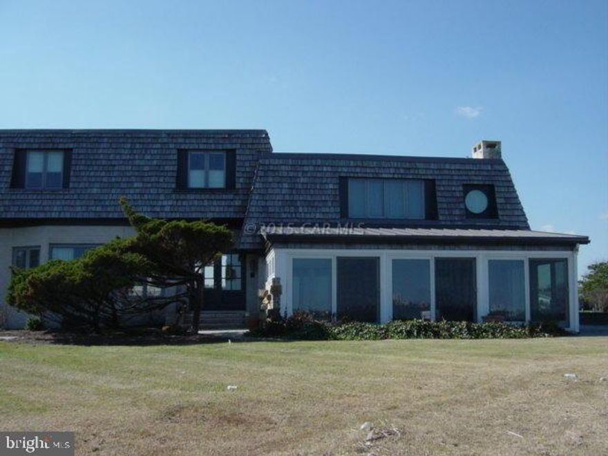 6 BEDROOM 5 1/2 BATH HOME ON 2 PRIVATE POINT LOTS WITH OVER 450 FEET OF DIRECT BAY AND CANAL FRONTAGE. WATER VIEWS FROM ALL ROOMS. OWNER HAS DONE EXTENSIVE RENOVATIONS INCLUDING: NEW BULKHEAD, DOCK, ROOF, PELLA WINDOWS, ANDERSON SLIDING DOORS, SWIMMING POOL, FLAGSTONE WALKWAYS, STACKED STONE SEATING WALLS, CUSTOM ANTIQUE HEART PINE LIBRARY, CUSTOM ANTIQUE PINE CARVED FRONT DOOR, WALKIN PANTRY WITH FARMHOUSE SINK, MEDIA ROOM WITH WET BAR, MIELE OVEN, BLACK WALNUT FLOORING, PRIVATE OFFICE WITH CUSTOM SHELVING AND BUILT-IN FILE CABINETS, HUGE MASTER CLOSET ROOM, SECURITY CAMERAS. MASTER BATH HAS A THASSOS WHITE MARBLE STEAM SHOWER WITH PEBBLE FLOOR, SOAKING/WHIRLPOOL TUB WITH BAY VIEW, KOHLER PURIST GOLD FAUCETS AND SHERLE WAGNER GOLD TUB & SHOWER FIXTURES.