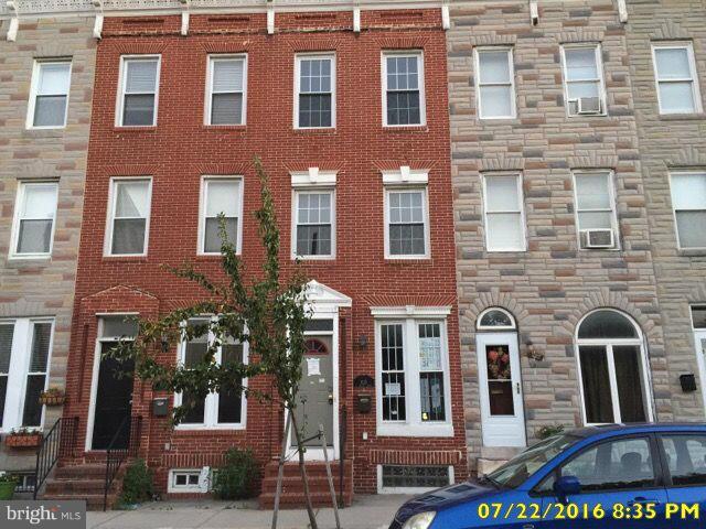Beautifully renovated by prior owner, 3 story (plus basement) with roof-deck! Property offers all the amenities today's buyer demands. Features include trim package (chair rail, crown & shadow boxes), gourmet kitchen (granite, SS App Package, backsplash, etc), true dining room, main level 1/2 bath, exposed brick, decorative fireplace, ceramic tiling, hardwoods, 3rd level master suite & more!