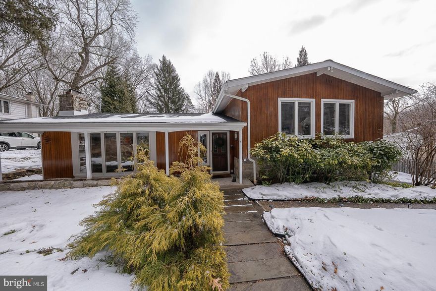 Welcome to 173 Gypsy Lane, your mid century modern dream home! This beautifully landscaped and expanded split-level with a two-car garage is located conveniently minutes from I-76 and the heart of King of Prussia. The entryway provides a coat closet, slate flooring, and indirect lighting.  Before entering the open living and dining space highlighted by the vaulted ceiling, & support beam, there are oversized windows welcoming lots of natural light. The living room has a stone front fireplace with wood mantle accents. This space easily accommodates a large sectional couch and 8-piece dining set. The gourmet island kitchen is equipped with white cabinetry, stainless steel appliances, herringbone flooring, solid surface countertops, and a large window overlooking the lush green backyard. The large slate terrace with grille is the perfect outdoor spot to host your friends and family. The lower level den provides additional living space, and features glass sliding doors open to the 2 story atrium with circular stairs to the primary suite. You will find  the 4th bedroom and plenty of storage space in the finished basement, as well as a 3rd full bathroom for your convenience. This level is home to the clothes washer and dryer, as well as a room housing the utilities. Upstairs is the first full bathroom, featuring a skylight, pocket doors, and seperated tub and shower. The primary suite fits a king-sized bed, has three closets, and features a walk-out to the atrium. The lovely ensuite bathroom is equipped with an updated vanity and large soaking tub. The second bedroom features hardwood flooring, and room for a queen bed. The third bedroom is currently used as an offfice. 173 Gypsy Lane is in an awesome location, minutes from unmatched shopping at both the King of Prussia Mall and Town Center. Enjoy quick access to Life Time Fitness, Wegmans and Trader Joe’s, Valley Forge Park, hiking along the Schuylkill River Trail, and the Radnor or Gulph Mills train station.  Walk to the neighborhood park for the tennis or tot lot.  Excellent, move in condition.