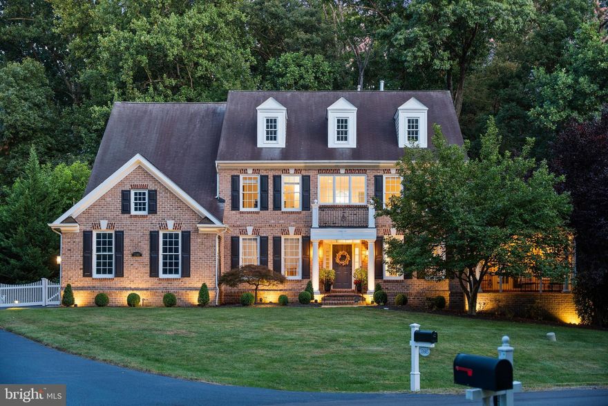Elegant Oakton Retreat on Nearly an Acre – Luxury Inside and Out
Tucked away in a private enclave of just four homes, this exquisite 5-bedroom, 4.5-bath brick Colonial offers almost an acre of beautifully landscaped grounds and exceptional living spaces. From the moment you arrive, the home’s stately curb appeal and timeless architecture set the stage for what’s inside.
Step through the front door and experience a flowing floor plan designed for both comfort and elegance. The main level boasts a sun-filled conservatory with fireplace, a private home office, an elegant dining room, and a gracious living room. At the heart of the home, you’ll find a brand new chef’s kitchen—a showstopper with custom white cabinetry, quartz countertops, professional-grade stainless steel appliances, a generous center island, and designer lighting. This culinary haven opens seamlessly to the expansive family room, anchored by a stone fireplace, creating the perfect gathering space.
Upstairs, the primary suite is a true sanctuary, complete with a spacious sitting area, oversized walk-in closet, and a stunning newly renovated bathroom. This spa-inspired retreat features a freestanding soaking tub, frameless glass shower, dual quartz vanities, and exquisite tilework. Three additional bedrooms, two full bathrooms, and a convenient laundry room with utility sink complete the upper level.
The walkout lower level offers a 5th bedroom, updated full bath, a woodworking shop with dust collection system, a large recreation room with the home’s third gas fireplace, and direct access to the patio. There’s also abundant storage and space for future customization.
Outdoor living shines here with a screened porch, an expansive low-maintenance deck, a fenced backyard, and a paver patio—all surrounded by mature trees and lush landscaping.
Located just minutes from major commuter routes, Metro stations, and everyday conveniences, this Oakton gem delivers the perfect blend of privacy, luxury, and accessibility.
A rare find—move-in ready and truly unforgettable.