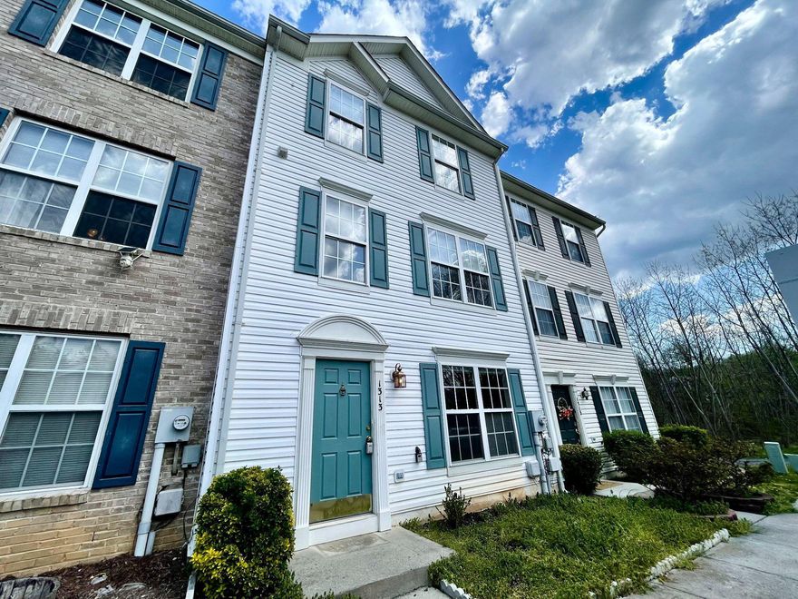 Ready to make a home *truly* your own? This Colonial-style townhouse in Hupps Ridge is full of potential and personality, just waiting for your personal touch. With 3 bedrooms, 3.5 bathrooms, and 1,840 sq. ft. of living space, you’ve got the perfect canvas to create something uniquely yours.

The layout is already there—now it’s your turn to bring the style. The kitchen comes equipped with stainless steel appliances (gas range, dishwasher, and refrigerator) and is ready for whatever vibe you envision, from modern refresh to cozy chic. The sunny living area features a gas fireplace and could easily become your favorite hangout spot with a little creativity.

Downstairs, the fully finished walk out basement gives you bonus space to play with—think home gym, movie lounge, gaming setup, or work-from-home zone along with a new full bathroom.

Step outside and unwind with a backdrop that feels like a mini escape from the daily grind. Plus, you’ve got assigned parking for two vehicles to keep things easy.

If you’ve been scrolling for something that doesn’t look exactly like every other listing, this is your chance. Add your style, build some equity, and create a space that actually feels like *you*.

Updates include: New Roof - 2025, New Washer/Dryer March 2026, Full bath on lower level, was converted to a full bathroom from a half bathroom.