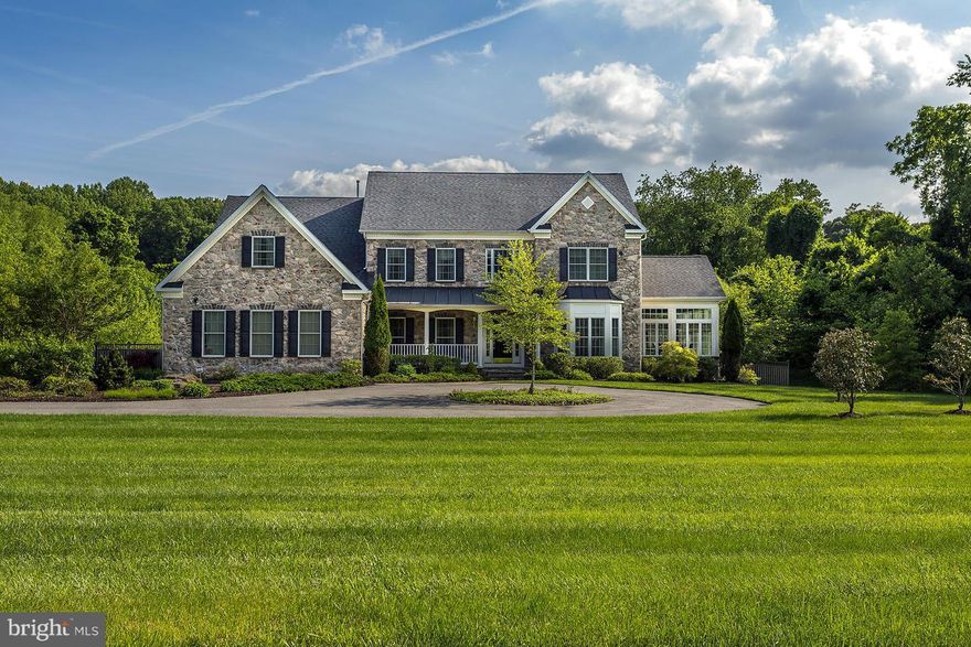 STUNNING Home – A True Gem! This exquisite custom home showcases superior craftsmanship and architectural details throughout, extending seamlessly to the beautifully appointed exterior with saltwater pool, hot tub, gazebo and fire pit.  bedrooms are ensuite, offering privacy and luxury for every resident. The spacious family room, featuring a cozy gas fireplace, is perfect for gatherings and relaxation. Gleaming hardwood floors add warmth and elegance to the home’s inviting ambiance. Whether you're hosting an elegant gathering or a casual get-together, the home’s versatile spaces make entertaining effortless. The gourmet kitchen is a chef’s dream, complete with a charming breakfast room that offers the perfect spot for morning coffee or casual dining. The main level includes a dramatic sunroom, an office, and convenient laundry area. The expansive lower level boasts a wet bar, recreation room, full bath, game area, and large storage room.

Recent updates include: a luxurious primary bath with heated floors, large steam shower, custom cabinets, dressing area, and a fully custom closet (2023), new water heater (2024), HVAC zone 1 (2022), and A/C zone 2 (2021). Ideally located with easy access to Washington, DC, and Baltimore. This home is truly a pleasure to show!