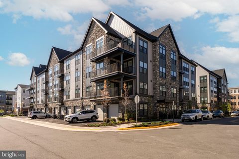 Photo of 23665 Havelock Walk Terrace #406, ASHBURN, VA 20148 (MLS # VALO2120928)