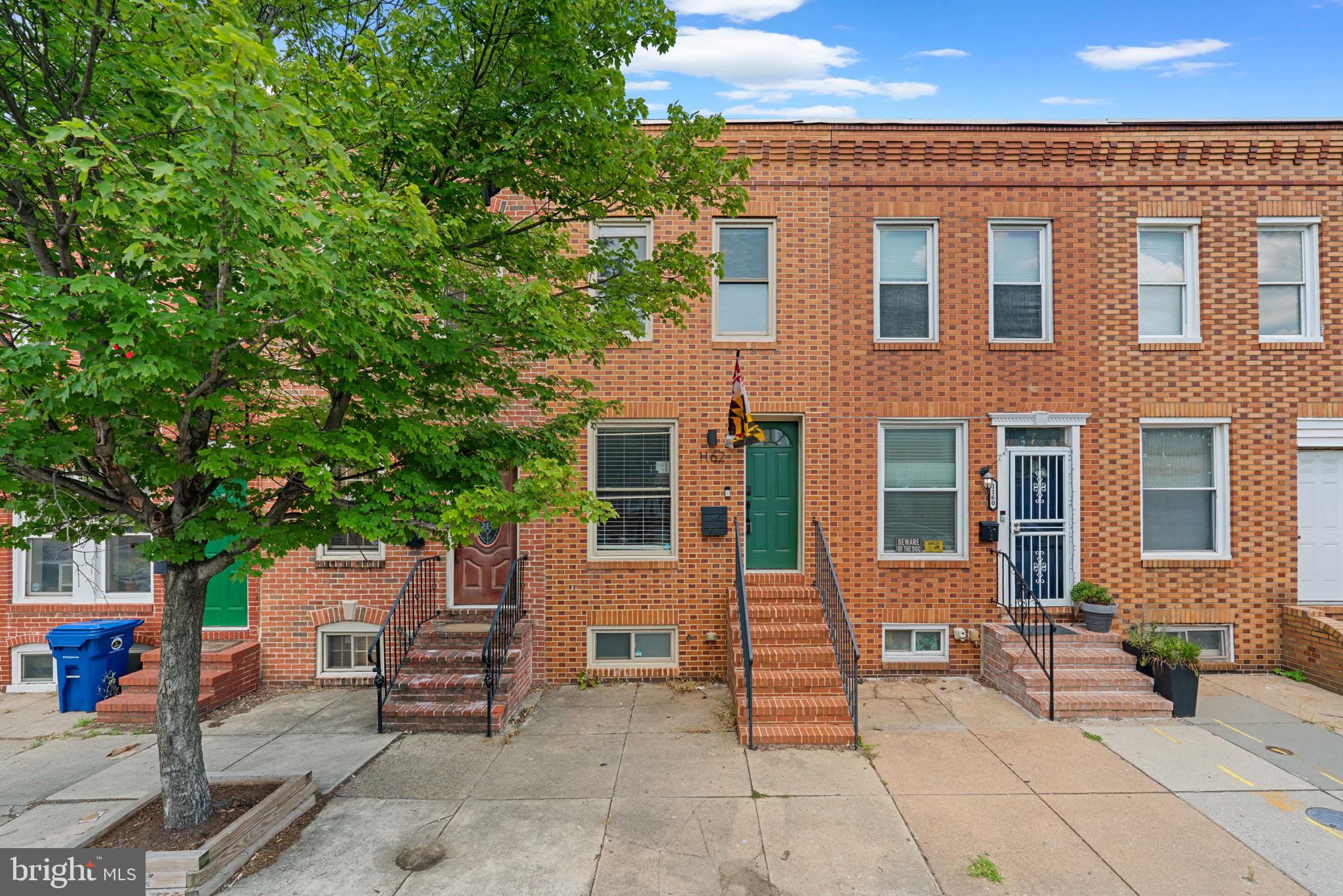 Discover the charm of 1162 Nanticoke St in Pigtown! This delightful residence offers 2 spacious bedrooms with stylish en-suite bathrooms along with a finished lower featuring 2 extra flex rooms and a 3rd full bathroom. In the open main level you'll find LVP flooring, exposed brick, and a kitchen showcasing elegant quartz countertops, a large island, and modern stainless steel appliances. The fenced rear patio is perfect for entertaining and summer BBQs. Located in a vibrant community, this home provides a perfect blend of comfort and convenience for those seeking a cozy urban haven.