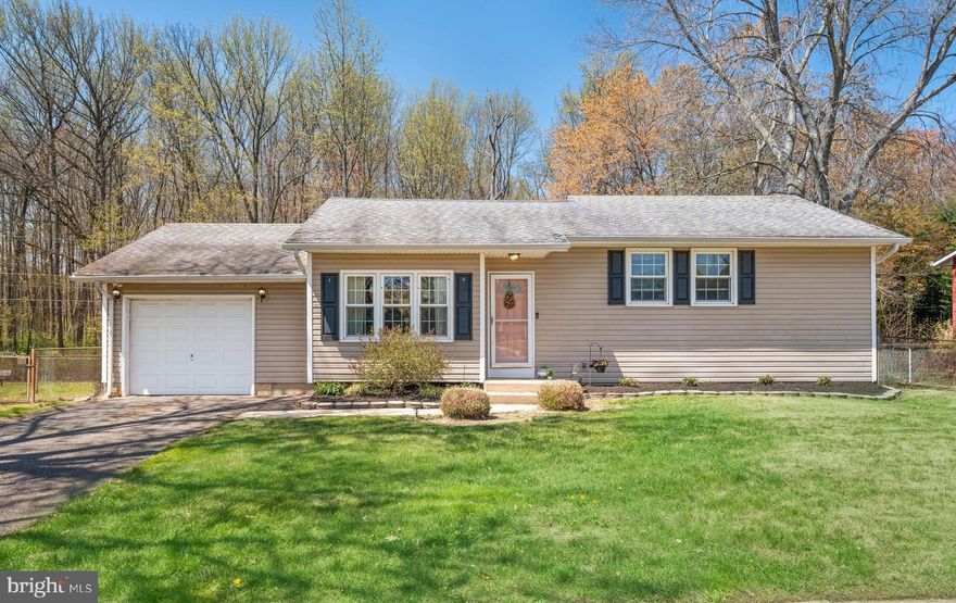 Welcome to this charming split-level home, ideally situated in the vibrant heart of Newark. Featuring 3 comfortable bedrooms and a tastefully renovated full bathroom, this inviting residence blends modern style with everyday functionality. Step inside to discover rich laminate hardwood flooring that flows effortlessly through the main living areas, creating a warm and cohesive atmosphere. The kitchen is a true standout, showcasing GRANITE COUNTERTOPS, a custom tile backsplash, and sleek STAINLESS STEEL APPLIANCES – including a NEW DISHWASHER. From here, step out onto the deck, perfect for grilling and outdoor gatherings. The deck overlooks a FULLY FENCED BACKYARD that backs to tranquil woods, offering both privacy and a scenic natural setting. A storage shed is included for added convenience. Upstairs, you’ll find all three bedrooms and the updated full bath, tucked just a few steps above the main level for a sense of separation and comfort. Downstairs, a full BASEMENT with Bilco doors provides plenty of space for storage or future finishing. The attached GARAGE adds even more versatility – whether for parking or additional storage. Additional highlights include: FRESH PAINT throughout, a NEW WASHER, Ring doorbell, and ALL APPLIANCES INCLUDED. All of this, just minutes from Christiana Mall, the University of Delaware’s main campus, and only one mile from Christiana Hospital. Don’t miss this opportunity – schedule your tour today!