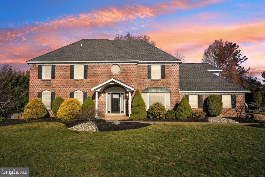 Welcome to this stunning, move-in ready, single-family home located in the highly desired Upper Dublin School District in beautiful Holly Hill. From the moment you enter, you’ll be captivated by the spacious and inviting open-concept living area featuring Brazilian Cherry hardwood floors that flow seamlessly throughout the main level. You're greeted by a grand two-story foyer and a stately curved staircase. The oversized formal dining room is a true standout, complete with a gorgeous chandelier and large windows that fill the space with natural light. This room flows effortlessly into the cozy family room, where you’ll find a charming brick fireplace (setup for wood or gas) surrounded by built-ins, perfect for relaxing and entertaining. The family room opens directly into the dining area and custom eat-in kitchen, creating an ideal layout for gatherings. The kitchen is a chef’s dream, boasting an island with seating, sleek granite countertops, tons of cabinet space, including a pantry, and a convenient pot filler over the stove. Just off the kitchen, you’ll find a versatile living room that would make a fantastic home office, playroom, or den. A beautifully updated half bath and a large laundry room with access to the backyard patio complete this level, as well as convenient access to the oversized three-car garage. Upstairs, the spacious bedrooms continue to impress. The primary suite is enormous, featuring not one, but two walk-in closets. The luxurious ensuite bathroom offers dual vanities, a soaking tub, and a separate stall shower. Additionally, there's a bonus room off the primary bedroom, perfect for a home office, sitting room, hobby room, or whatever your lifestyle demands. The three secondary bedrooms share a full hall bathroom with a dual vanity and tub/shower combo, providing ample space for family and guests. A walk-up attic is accessed from this level for additional storage. The finished walk-out basement offers even more living space, wide open and ready to be customized for your needs. Outside you'll find the flat, fully fenced backyard with a privacy fence—ideal for outdoor activities and relaxation. The Trex deck off the kitchen provides the perfect spot for al fresco dining, while an adjacent brick patio offers additional outdoor entertaining space. This home is located in a prime location, close to shopping, dining, grocery stores, and the scenic Pine Run Park. With its exceptional features and unbeatable location, this home is truly a must-see!