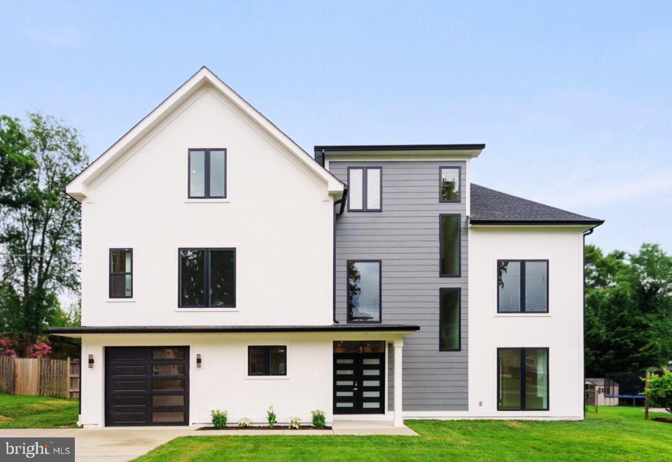 Welcome to this stunning custom-designed modern transitional home in the heart of Springfield, VA! This new construction offers an unbeatable location with quick access to I-495, I-395, and the Franconia-Springfield Metro, making it ideal for easy commutes to major employers like the Pentagon, Amazon, and Inova Health. Enjoy the serenity of suburban living while being just minutes from Lake Accotink Park and Springfield Town Center. This stunning home spans three levels with an abundance of features to elevate your living experience. Open floor plan with 10-foot ceilings in main level and 9-foot ceiling in second and third floor, and high-efficiency LED lighting throughout. Main level welcomes you with a formal living and dining area, complemented by an inviting electric fireplace, a spacious office, a beautiful gourmet kitchen, quartz or granite vanity and countertops, stainless steel appliances, and a one-car garage adds convenience to your daily routine. Second level has four bedrooms, each with its own en-suite bathroom and spacious closets, including a luxurious master suite with oversized walk-in closets and a spa-like bathroom, and a laundry room. The upper level offers additional living space including a versatile recreation room with a wet bar, a spacious playroom/bedroom, full bathroom, perfect for family fun or hosting guests. Outside, the expansive yard provides ample space for outdoor activities and relaxation. All new in 2025 but some original part of the concrete slab and cinder block walls have been retained. Estimated completion date is July 2025, still time to customize some of your final finishes. ****Pictures are of builder's past project***