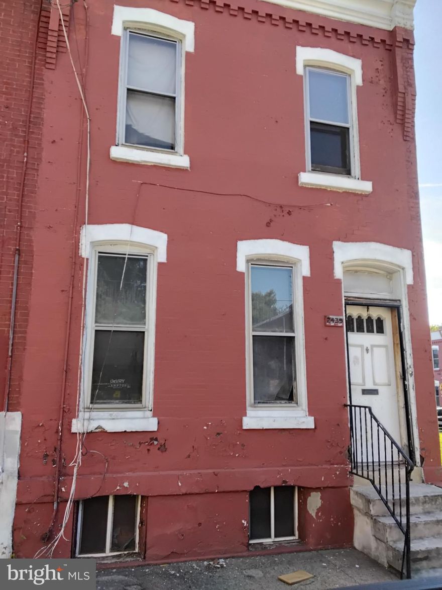 Property sold AS-IS WHERE-IS.  Major Rehab needed to transform this old charm back to its original beauty. No electricity, bring flashlight.  Property in primely located in up + coming Avenue of the North. Within a mile of public transportation options, this property ensures easy access to the city, attracting a steady stream of potential renters or ideal for owner occupant after rehab.