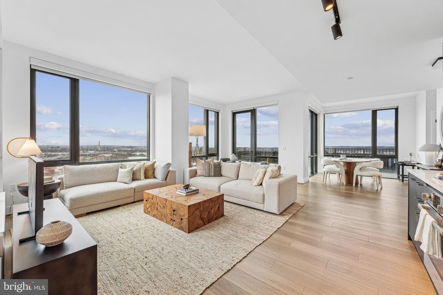 Welcome to unparalleled luxury in this brand-new, never-lived-in penthouse. This stunning 2-bedroom, 2-bathroom home boasts nearly 1,300 square feet of sophisticated living space with a large open floor plan that’s perfect for entertaining or relaxing. Revel in the floor-to-ceiling windows offering truly breathtaking panoramic views of D.C. the Potomac and Washington Reagan Airport. Create exquisite meals in your Chef's kitchen with top-of-the-line Bosch appliances, quartz countertops, and a sleek modern design. Gaze at the stars on your huge private roof terrace, your personal outdoor oasis for dining, entertaining or simply soaking in the scenery. Enjoy the ultimate lifestyle in this full-service building with 24/7 concierge services, secure package system, state-of-the-art fitness center, Sky Lounge with panoramic views, Billiards, spacious outdoor pool, and more. Secure underground parking is available to lease for your convenience. This penthouse offers a once-in-a-lifetime opportunity to live in an iconic location, just steps from the best that National Landing and D.C. have to offer. Don’t miss your chance to call this luxurious retreat your new home.