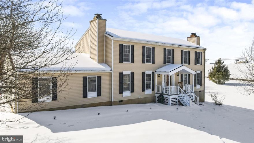 Enjoy gorgeous sunsets and scenic views from this roomy 4 bedroom 2.5 bath Colonial sitting on over 2-acres. Conveniently located, only minutes to The Shenandoah River, Charles Town WV,  Harpers Ferry WV and the Leesburg VA area. Two fireplaces, one in the living room and one in the den offer a cozy atmosphere while  relaxing or working from home. Well laid out kitchen with stainless steel appliances and gas cooking flanked by a large breakfast room and a separate formal dining room.  Upstairs there are four generously sized bedrooms. The primary bedroom has a large walk-in closet and full attached bathroom with a tub and separate shower. There's even an intimate little reading area tucked away upstairs. Outdoors it gets better! There are approximately 15 fruit and nut trees of varying species on the property and 100's of perennials in the fenced garden area and around the deck offering beautiful blooms throughout the growing season. Brand new HVAC in 2025! Newer roof and siding. This is a great home in an excellent area. Make an appointment for your private showing today before it's too late!