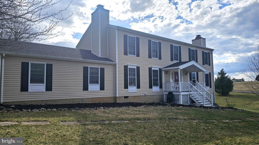 Come to Charles Town, WV and enjoy gorgeous sunsets and scenic views from this roomy 4 bedroom 2.5 bath Colonial sitting on over 2-acres. Conveniently located, only minutes to The Shenandoah River, Charles Town WV,  Harpers Ferry WV and the Leesburg VA area. Two fireplaces, one in the living room and one in the den offer a cozy atmosphere while relaxing or working from home. Well laid out kitchen with stainless steel appliances and gas cooking flanked by a large breakfast room and a separate formal dining room.  Upstairs there are four generously sized bedrooms. The primary bedroom has a large walk-in closet and full attached bathroom with a tub and separate shower. There's even an intimate little reading area tucked away upstairs. Outdoors it gets better! There are approximately 15 fruit and nut trees of varying species on the property and 100's of perennials in the fenced garden area and around the deck offering beautiful blooms throughout the growing season. Brand new HVAC in 2025! Newer roof and siding. This is a great home in an excellent area. Make an appointment for your private showing today before it's too late!