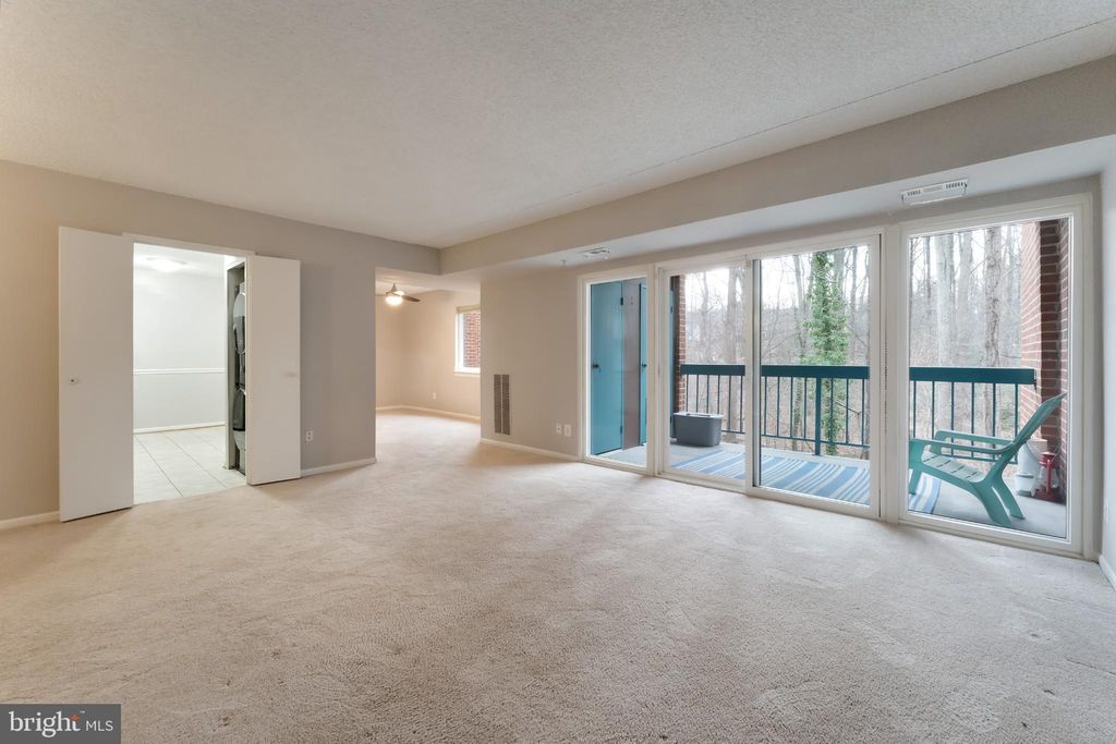 Photo of 11833 Shire Court #11B, RESTON, VA 20191 (MLS # VAFX2285986)