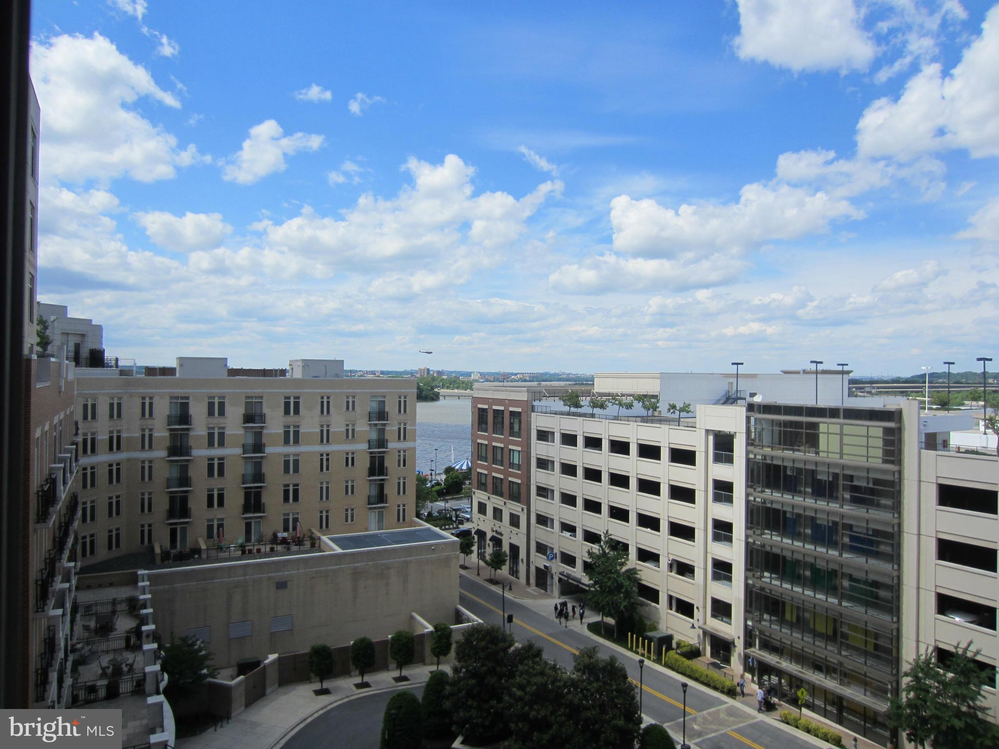 This condo unit at National Harbor, offers one of the largest one-bedroom unit with a den and a full bathroom on the 7th floor. Gleaming hardwood flooring, upgraded 42" kitchen cabinets, upgraded SS appliances, granite countertops, custom closet system to maximize storage, custom woodwork, lighting package and much more. Rent includes a premium garage parking space and a large storage unit. National Harbor is a waterfront community located on the Potomac River, just south of Washington, D.C. It is known for its vibrant atmosphere, entertainment options, and scenic views. This unit includes a spacious bedroom, a living area, a kitchen, and a bathroom. The den can be used as an additional small bedroom, office space, or a flex room according to your needs. Living at National Harbor offers several advantages, such as Location: National Harbor is conveniently located near major transportation routes, including I-95 and I-495, providing easy access to the Washington, D.C. metropolitan area. Amenities: Condo buildings in National Harbor comes with a range of amenities, such as fitness centers, swimming pools, meeting room, clubhouse with billiard table, concierge services, and private parking. Waterfront Living: National Harbor offers stunning views of the Potomac River and a lively waterfront area with restaurants, shops, and entertainment venues. Entertainment Options: National Harbor is home to the MGM National Harbor, a world-class resort and casino, as well as the Capital Wheel, a large Ferris wheel providing panoramic views of the area.