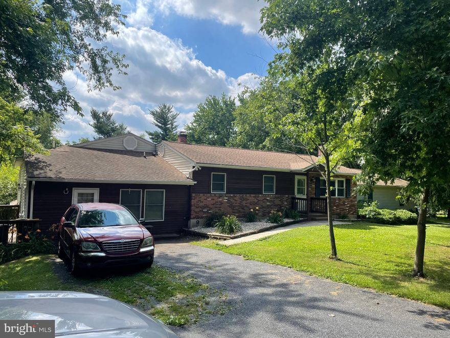 Sprawling & Versatile One Story Home with a full finished basement and more. If you need space, look no further. This home has 6 bedrooms and 4 bathrooms, 2 in law suites and more. Located on acreage, this could be your perfect country home. Hardwood floors, updated baths and more. Must see to appreciate.