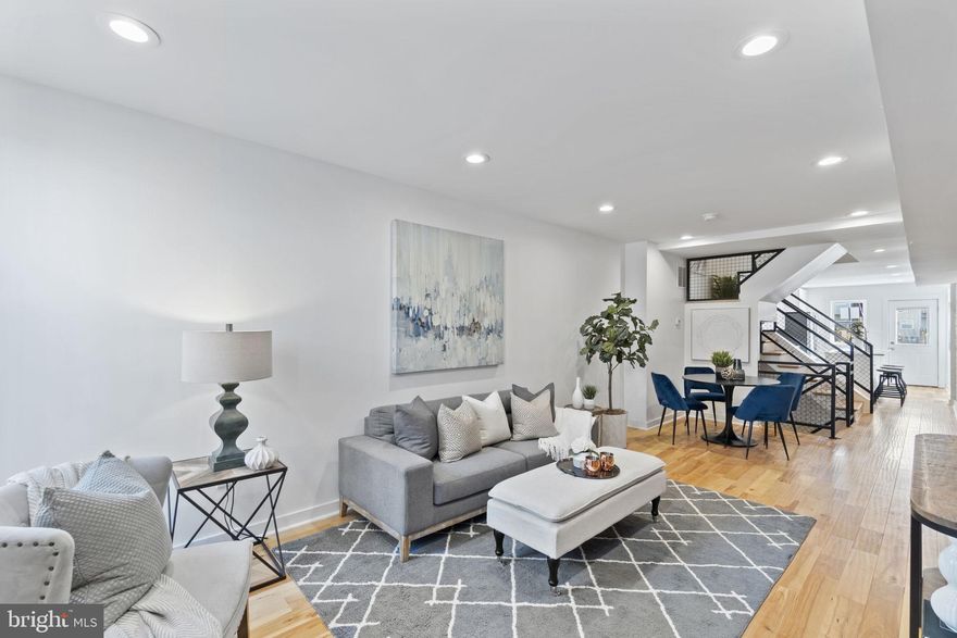 Newer Construction - Carpet Allowance with acceptable offer. 3 bedrooms and 3 full bathrooms. Welcome to 1825 S Hanover Street — Where Modern Edge Meets Baltimore Charm. Completely renovated just three years ago from top to bottom, this stunning rowhome offers peace of mind and polished design in one perfect package. Featuring all new windows, HVAC, electrical systems, and plumbing, the heavy lifting has already been done — allowing you to simply move in and enjoy. Ideally located just moments from City Garage and Baltimore Peninsula, and minutes to everything happening in Federal Hill and Locust Point, this home delivers both convenience and lifestyle. Inside, you’ll find: - Gorgeous hardwood floors throughout, Sleek quartz countertops, Stainless steel appliances, Exposed brick accent walls that add warmth and character. A custom industrial open staircase that makes a bold architectural statement. With 3 spacious bedrooms and 3 full bathrooms, including a beautifully finished lower level, the layout offers flexibility for guests, a home office, or additional living space. Rear private courtyard and 2 car parking available. Parking is a separate tax record 1816 Olive Street. This is city living done right — stylish, efficient, and walkable to some of Baltimore’s most vibrant destinations. Modern updates. Timeless character.