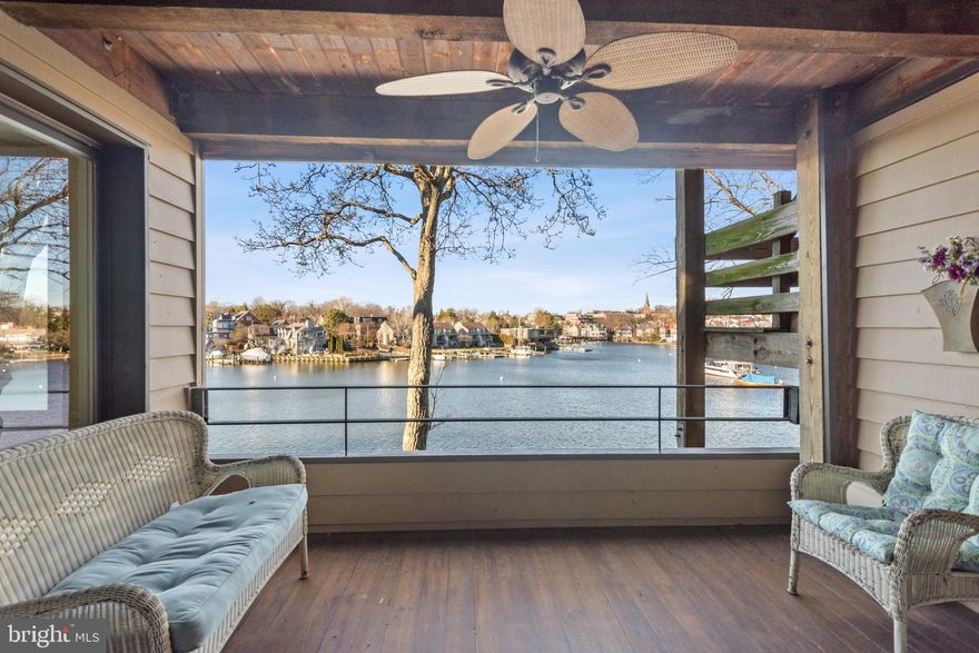 The premier waterfront condo in trendy Eastport of Annapolis - "The Point" - with spectacular views of Spa Creek, Maryland State Capital and historic Annapolis. This gorgeous two bedroom and two bath condo features a beautifully renovated kitchen with top of the line, energy efficient appliances, tankless hot water heater, foot friendly cork floor, and Caesarstone countertops.  The spacious living room features a wood burning fireplace and cozy alcove den. Other improvements include upgraded Marvin and Pella windows/sliders, commercial quality carpet, and a newer HVAC system. Double balconies including great water views from the primary bedroom.  Extra storage space is in the same building. The "Point" community offers fabulous amenities - deep water boat slips, community clubhouse, swimming pool, tennis/pickleball courts, EV Auto Charger, kayak/canoe rack, pet friendly, and plenty of free parking spaces. Walk, water taxi, or a two minute ride to historic downtown Annapolis.