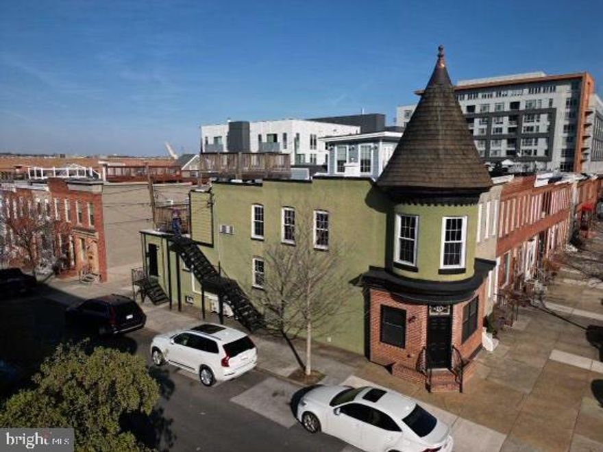 Elevate your urban lifestyle with this Federal Hill row home turned dual apartments, featuring a coveted parking pad and a rooftop deck offering 360° city and harbor vistas. Delight in the independence of separate utilities, a gas stove, and efficient HVAC mini-split systems. Bask in the natural light streaming through front, rear, and side street windows, creating a warm ambiance for every sunset. Nestled on a serene side street near the Museum of Industry, you'll enjoy proximity to various stores, restaurants, coffee shops, yoga studios, and gyms. Perfect for an in-law apartment or a smart investment in a prime Federal Hill location. Don't miss the chance to call this versatile property home! Also listed as Multi-Family - MLS#  MDBA2117348. Taxes TBV by buyer.