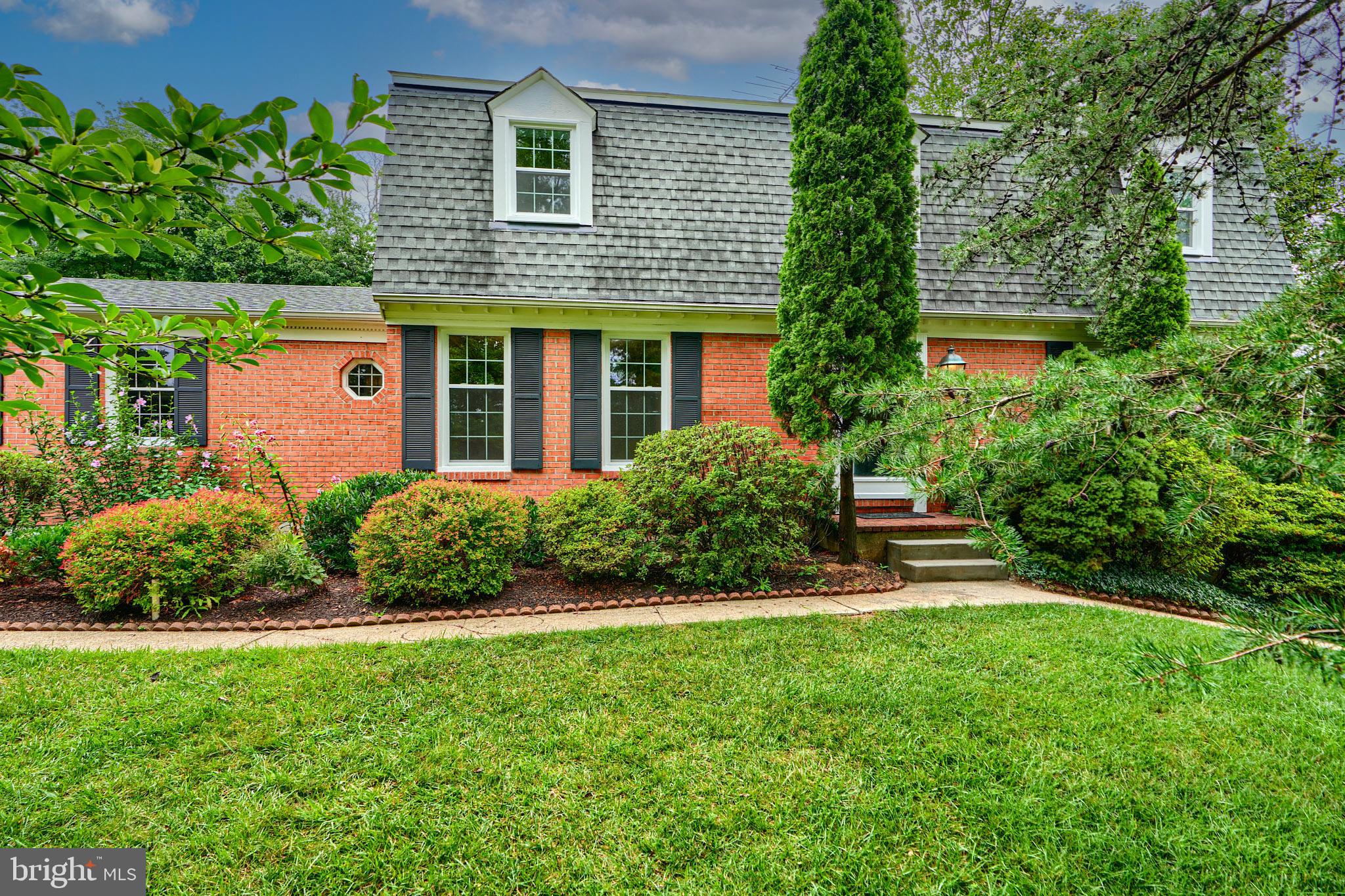 Introducing a spacious and updated true four bedroom home in highly sought after West Towson/Ruxton! Fresh and inviting - this home allows you to spread out and enjoy great entertaining flow and spacious living. The main level offers both an extra large living room and a family room with a wood burning fireplace, both flowing onto a huge deck large enough for grilling, dining AND relaxing. Roomy kitchen, with table space, abuts the family room and a formal dining room, powder room and foyer complete the first floor layout. Upstairs, you will find a primary bedroom with separate dressing area and toilet/bathing room, plus three additional generously sized bedrooms and adorable hall bath. The lower level adds additional living space with a finished portion for TV watching, working out and/or a playroom area. A huge unfinished room is available to fill with all of your out of season treasures. Two car side entrance garage and circular drive allow for easy in and out. Set back from the road and veiled by mature tress and a canopy of blooms in Spring - this is a beautiful home where you can put down roots and grow.
