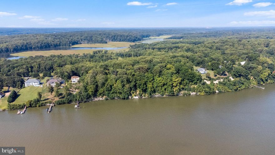 Rare opportunity to purchase 2+ acres of wooded, waterfront land directly on the Potomac River!  Marlborough Point is a magical riverfront location in historic Stafford County that offers nearly everything you could ask for.  Enjoying some of the best river views in Virginia, this luxurious community is a very private oasis of natural beauty with several $2M+ homes, served by a single roadway.  Truly a retreat in every sense of the word.  

Two adjacent lots are available for individual sale; 417 Marlborough Point Rd (2.09 ac) and 421 Marlborough Point Rd (2.22 ac).  Each lot has direct waterfront access with over 100’ frontage on the Potomac River, each has been approved for a 4-bedroom septic field, and each is further subdividable into two 1-acre lots, if desired.  You could build two homes; a dream home overlooking the water for yourself, plus an income-producing property or home for extended family and relatives.  Do you have a bigger vision and need more land?  Purchase both lots and build a custom estate on 4.3 acres!  

Each property offers gorgeous sunrises from wooded elevations with a slope down to the water.  You’ll be surrounded by pecan, elm, and other canopy trees while the shoreline awaits your future pier or private dock, with deep water suitable for sail or power boats.  (There is an existing, paved driveway leading to a vacant home at 417 Marlborough Point Rd.  The structure was damaged by a previous fire and is considered a tear-down; for safety reasons DO NOT ENTER.)

Nature enthusiasts will love nearby Aquia Landing Park (a 32-acre public beach with fishing, swimming, and picnicking) and the Crow's Nest Natural Area Preserve (3,000+ acres of wetlands, forest, and streams, home to bald eagles).  Stafford is ideally located between Northern Virginia and Washington DC to the north, and Fredericksburg to the south.  You’ll benefit from the modern Stafford Hospital and commuters will appreciate the convenience of Route 95, Route 1, and the Brooke Station VRE.  Stafford could be a perfect location for your weekend waterfront home or your full-time residence.  From here you can visit area wineries/breweries, charter a local fishing boat, go antiquing, shark tooth and fossil hunting, explore historical sites, visit local farms to buy the freshest produce available… or simply relax and enjoy the amazing waterfront views!