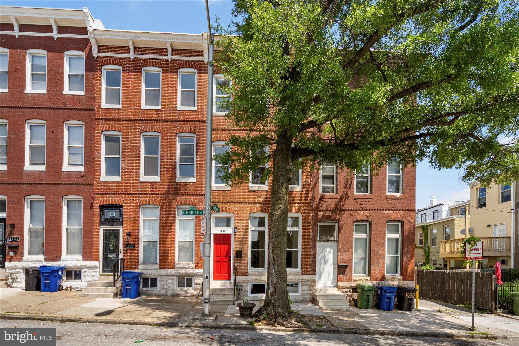Located in the thriving and historic Oliver neighborhood, this fully updated 4-bedroom, 2.5-bath residence offers timeless character paired with modern enhancements—and it's CHAP tax credit approved for significant long-term savings. With quality finishes, thoughtful design, and eligibility for down payment assistance programs, this home stands out as an exceptional value in a highly desirable area of Baltimore.
Inside, you'll find a light-filled main level with newly refinished hardwood flooring and an airy layout that flows effortlessly from the front living space to a well-appointed kitchen and dining area. The kitchen is a showstopper, featuring quartz countertops, all-new stainless steel appliances, soft-close cabinets, a striking custom tile backsplash, and a large center island perfect for gatherings or casual meals. A convenient half bath adds function without sacrificing style. Upstairs, the comfortable bedrooms share a beautifully renovated full bathrooms with contemporary fixtures and finishes. The third level features a private suite with an additional bedroom, a second full bath, and a spacious flex room ideal for working from home, relaxing, or hobbies. The partially finished basement offers more versatility, whether you need extra living space, a home gym, or additional storage. Out back, the paved yard creates a private outdoor escape—perfect for grilling or unwinding. With easy access to Johns Hopkins Hospital, commuter routes, and vibrant neighborhoods like Fells Point, Harbor East, and the Inner Harbor, the location provides both convenience and community connection.
Eligible for the Live Near Your Work (LNYW) program with grants up to \$17,000, and the Buying Into Baltimore incentive offering \$5,000 in assistance, this property delivers not just a beautifully finished home but an opportunity for smart, strategic homeownership in one of Baltimore’s fastest-growing neighborhoods.