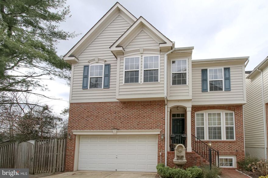 BEAUTIFUL BRICK FRONT  THREE LEVEL SINGLE FAMILY HOME IN CHANTILLY - FOUR BEDROOMS,  FOUR FULL BATHROOMS AND ONE HALF BATHROOM - TWO CAR GARAGE - FRESHLY PAINTED - HARDWOOD FLOORS IN LIVING AND DINING ROOM - GOURMET KITCHEN WITH STAINLESS STEEL APPLIANCES - SPACIOUS BREAKFAST AREA - ADJOINING DOOR TO THE DECK OVERLOOKING TREES  AREA - GENEROUS SIZE FAMILY ROOM  WITH A GAS FIREPLACE AND A CEILING FAN - LARGE MASTER BEDROOM WITH AMPLE WINDOWS - UPGRADED MASTER BATHROOM WITH SEPARATE TUB AND SHOWER - ONE BEDOOM HAS ITS OWN PRIVATE BATHROOM - LAUNDRY ON THE UPPER BEDROOM LEVEL FOR YOUR ADDED CONVENIENCE - HUGE FINISHED BASEMENT HAS CERAMIC TILED FLOORING , RECESSED LIGHTS  AND A WET BAR - SEPARATE MEDIA ROOM FOR YOUR ENTERTAINMENT- FULL BATHROOM ON THE LOWER LEVEL - BASEMENT HAS WALK OUT STAIRS ON TO YOUR OWN PRIVATE FENCED  BACK YARD - CONVENIENTLY LOCATED NEAR RT 50, RT 66, RT 286, RT 28, DULLES AIRPORT, SHOPPING, RESTAURANTS AND MORE