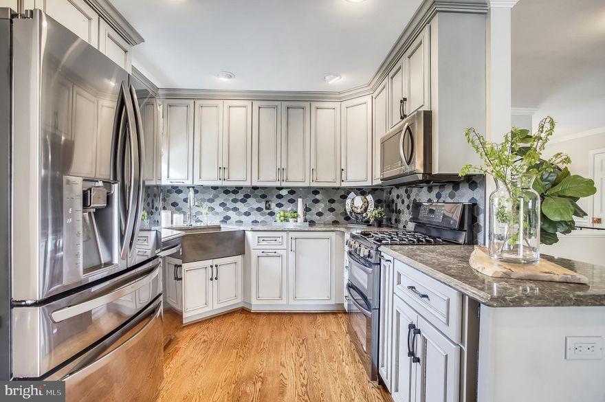 Open houses are CANCELED!!!  Welcome home!  Enjoy the beautiful view of the woods while spending time in the sunroom added to the back of this property located in Meadowland subdivision, in an extremely friendly and quiet neighborhood!  Not only this home has been perfectly  maintained by the same family since it was built, it was also fully renovated in 2016/2017 (refinished floors, bathrooms, recessed lights, kitchen, deck,  Andersen French doors, brand new window galore,  spacious house addition, motorized awning, extra insulation, new siding, painted exterior, outdoor lighting, and way more!!!)  Walking into this property already makes you feel like home! As you walk in, you see the living room to your right, with wonderful lighting due to the large window, allowing a charming view of the street. As you go you will find the open living room with  beautiful built- in bookshelves and a gas fireplace followed by the dining room and kitchen with brand new windows, new cabinetry, granite countertops, farm sink, designer backsplash,  high end LG appliances and touch on/off faucet.  To your left, you will see one of the three full bathrooms, the master bedroom with another full bathroom inside, the spare bedroom that can be used as an office, and the outstanding addition made to the house: the sunroom! The sunroom is one of the coziest rooms in this home given its breathtaking view of the woods, the creek and access to the timeless Trex deck for friends and family gatherings.  This home also has a fully finished walk out  basement, with a full bathroom, multiple rooms, including one that was previously used as a theater room, with soundproof insulation and plenty of storage space. A new sump pump was also added to the basement.   As if this was not already enough for this home to be considered perfect, the property also has a outbuilding in the backyard with full electricity within.  Another amazing features of this home are:   - Extended driveway that fits 4 cars - Oak hardwood floors  - Recessed lighting  - Tyvek insulation in the vinyl siding - Custom designed window treatments throughout the house, including new screens - Honda generator in case of a power outage - Low voltage outdoor lighting  This could be your paradise!!!