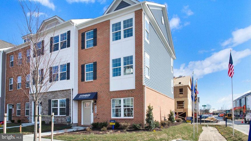 This end unit town home located near green space is situated near privacy. This Columbus townhome offers1,962 square-foot, with 3 bedrooms, 2.5 bathroom, an 18x6 DECK INCLUDED and 2 car rear loading garage. This home is spacious and features an open living concept. The main level features a middle island kitchen with Stainless Steel Whirlpool kitchen appliances with 5-burner gas range, upgraded White Cabinets and Quartz counter tops. Hard surface flooring on whole main level. The third level has a gorgeous primary bed with a large walk-in closet and features a luxury owners shower with Quartz counter tops. Two secondary bedrooms, upper level laundry hook up, and hall bathroom with Quartz counter tops. There is plenty of space for entertaining family and friends in your finished lower level rec room. This home is also equipped with smart home technology. The package includes a keyless entry, Skybell (video doorbell), programmable thermostat to adjust your temperature from your smartphone and much more. Commuting and traveling is made easy with quick access to 1-495, Route 5 and to the Washington DC area.