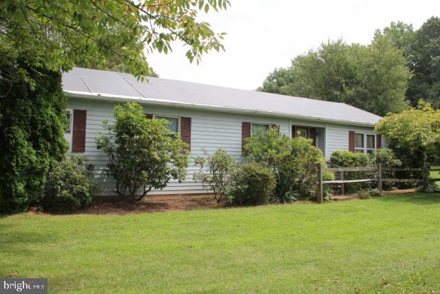 http://www.LancasterOpenHouses.com/Almost 1.5 acres of park like setting to call your own. Use existing 1972 double wide, replace with new or remove and build your dream home. Due to age and condition of existing home only cash offers will be considered. The home is being sold "as is." Working well and septic. Backs up to horse pasture.