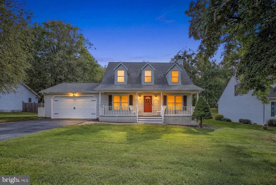 Thoughtful upgrades, standout flexibility (hello, main-level in-law suite!) and unbeatable commuter convenience come together beautifully at 16 S. Pointe Lane in Stafford County.

Originally built in 1992 and carefully improved over the years, this charming 4-bedroom, 3.5-bath Cape Cod-style home sits on a peaceful ⅓-acre lot in the quiet Ridge Pointe community. With mature trees, calm streets and easy access to the best of Fredericksburg, it’s the perfect balance of tranquility and everyday convenience.

From the moment you arrive, the home makes a warm first impression. A classic beige exterior, maroon front door and manicured yard with a stately shade tree create instant curb appeal. The current owners have enhanced the landscaping, added a sprinkler system to both the front and back yards, and freshly restained the inviting front porch. An asphalt driveway leads to the two-car garage, complete with cabinets, countertops and work shelving—ideal for hobbies, projects or extra storage.

Out back, the home really shines. The fully fenced yard includes three access points, a storage shed and a spacious deck with built-in bench seating that’s ready for summer barbecues, evening gatherings or quiet mornings with coffee. There’s even room along the side of the home to park a utility trailer. With woods just beyond the property line, the backyard offers a peaceful backdrop where squirrels and birds are regular visitors outside the kitchen window.

Step inside and you’ll immediately notice the thoughtful updates that blend modern style with cozy comfort. The main level features upgraded LVP flooring, updated lighting and a beautifully remodeled kitchen that truly serves as the heart of the home. Highlights include crisp white cabinetry with crown molding, a farmhouse sink, newer appliances and a custom island with seating for two—perfect for casual meals or conversation while cooking.

Just off the kitchen, a pocket door opens to a spacious living room centered around a farmhouse-style fireplace with built-ins, creating a welcoming space to relax or entertain.

One of the home’s most valuable features is the private main-level in-law suite addition. Complete with its own kitchenette, walk-in shower and French door entry, it’s ideal for guests, multigenerational living, a private office or even long-term stays.

Upstairs, three additional bedrooms and two full baths provide plenty of room for everyone. The primary suite feels bright and airy thanks to charming dormer windows and dual closets. Fresh LVP flooring, newer ceiling fans and updated lighting keep the entire upper level feeling crisp and refreshed.

Major systems have also been thoughtfully maintained, including HVAC (2021), heat pump and air handler (2020), and garage door (2020). A crawl space provides additional storage options as well.

And the location? It’s hard to beat. Downtown Fredericksburg and the Leeland Road VRE Station are each less than five minutes away, putting dining, shopping and commuter rail access practically at your doorstep. Grocery stores, restaurants and everyday essentials are just as close, and commuters will appreciate quick access to three nearby I-95 exits—Route 17, Route 3 and Centreport Parkway—all within about a 10-minute drive.

The home is served by Stafford County Public Schools, with Grafton Village Elementary School, Dixon-Smith Middle School, and Stafford High School as its designated schools.

Peaceful neighborhood living, flexible space and a commuter-friendly location—16 S. Pointe Lane truly checks all the boxes. Schedule your showing and come see it for yourself!