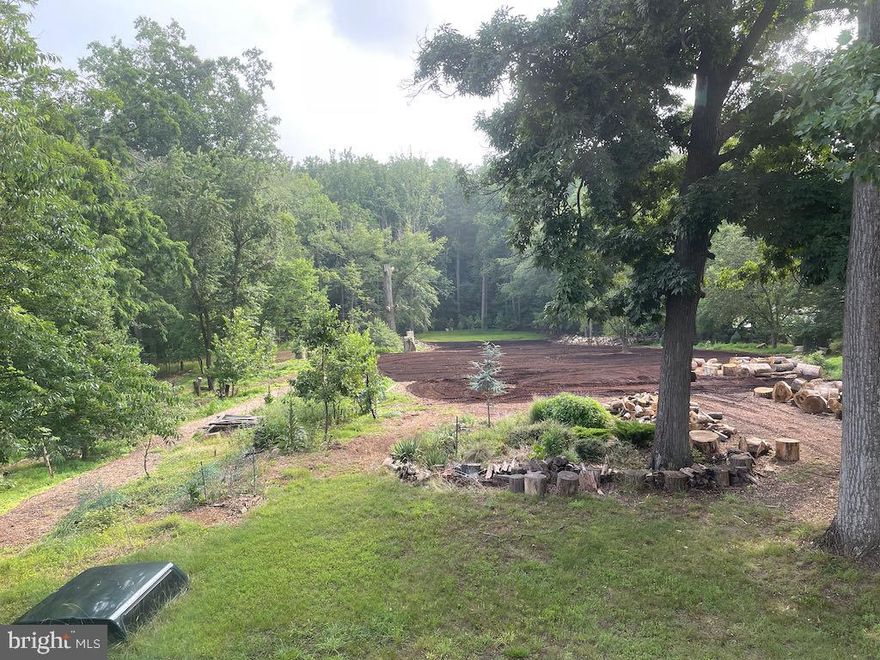 2.48 Acres in Montgomery County. 182-ft x 592-ft Sold AS-IS. Value is in the land with stream and pond, new privacy landscaping with new trees on property lines. This is a park like setting with private trail network.  Backs up to other wooded lots for a real oasis.  Low traffic street.  City Water.  Septic existing and also passed 3BD perc test by county.  Great place for new dream home or addition/complete renovation of existing 1945 structure or just need SPACE for agriculture or possibly landscape nursery business.