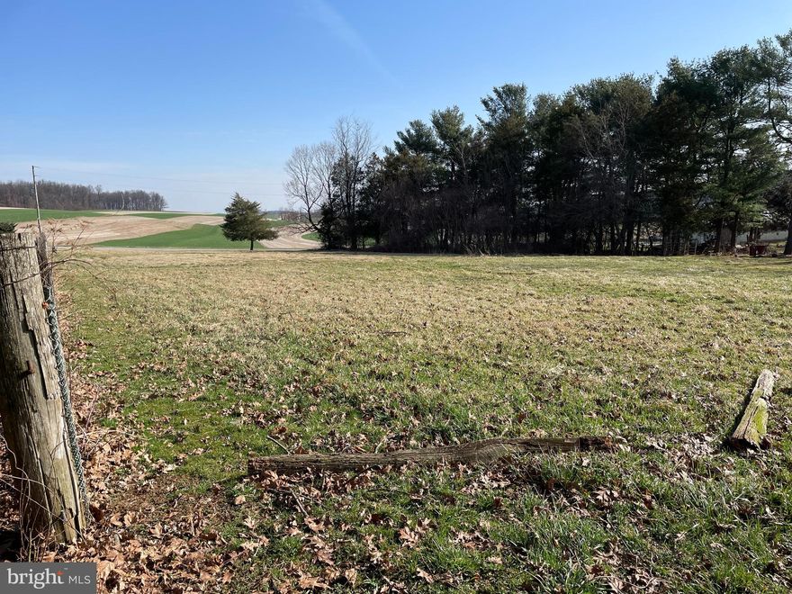 Picturesque 1.16 acres in Southeastern School District. Views of fields. Land is a level field with a strip of trees and a 40' x 25' barn. Lot has approved PERC test. The owner had animals years ago. Check with township to confirm if animals are still allowed. Access from Hyson School Rd.