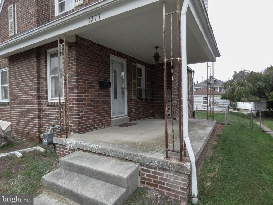 This 2 bedroom, 1 bath brick & aluminum 1 1/2 story home built in 1939 is being sold “AS IS” - this is an estate sale & a short sale & a reverse mortgage - the seller won’t make any repairs to the home or the garage - so don’t ask.  This property has deferred maintenance from peeling lead based paint to a tarp covering a broken basement bilco door which leaks, a clearly water damaged basement, a leaky roof in multiple locations, carpeted floors, a dated full bath & lead based paint peeling ceilings in the kitchen.  Gas radiator boiler in the bsmt appears to be original to home.  Use caution on front porch as the concrete is failing & porch supports are rusted.  Front door does not operate - door knob is broken - must use side door.  DANGER: Do not walk on the blue tarp on the rear deck - the deck is not safe.  Kitchen window has plastic covering - do not remove - window has a problem.  Plexi-glass covering the casement windows on gable end of the home to reduce water flowing into the bsmt when it rains - do not operate bsmt casement windows.  Water logged pool table in the bsmt will not be removed by seller.  Listing agent has not tested for mold in the bsmt - enter at own risk.