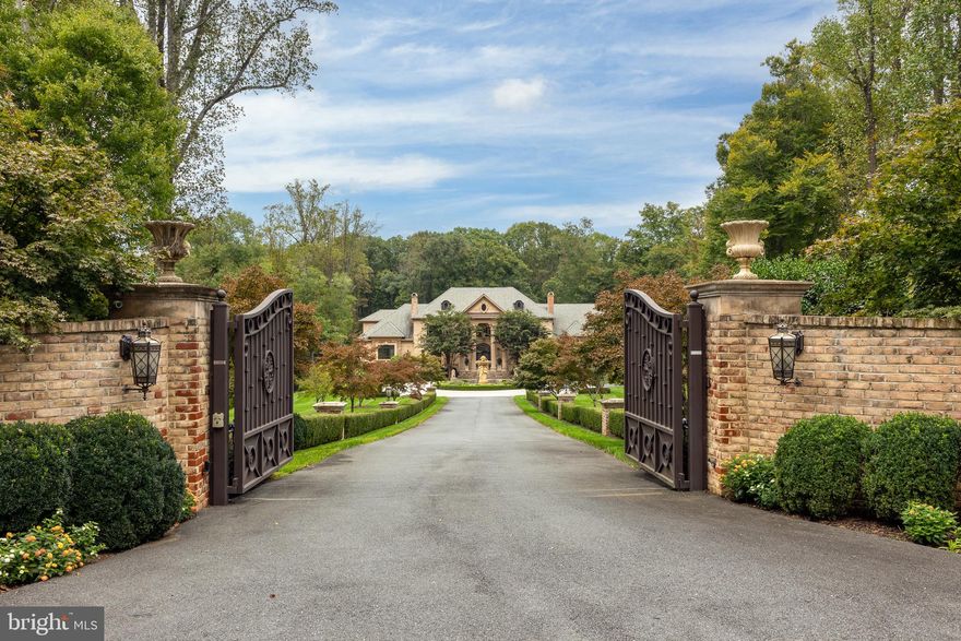 This is one of the finest homes on the market, set on a breathtakingly elegant property. Initially constructed in 2012 by a most celebrated builder, The Building Group, the home underwent a significant renovation in 2023, enhancing its opulence with a perfectly balanced modernism. The scale is delightful, so every room is arranged most comfortably. There is an abundance of space that creates open contemporary spaces without sacrificing properly formal living and entertaining rooms. The all-new kitchen and adjacent family room are calling for the latest review from Architectural Digest; the materials and total aesthetic are timeless yet modern and create one of the warmest gathering places in the entire home.  This home gives a consistent feeling on every level and with every amenity. The primary suite commands an entire wing of the main level, with soaring ceilings, a romantic sitting area beneath the grand windows, unbelievable dressing rooms, and a brand-new white marble primary bathroom. More amenities include the home theater room, a full bar, wine cellar, billiards room, fitness room, sauna, and a full lower-level walk-out to the impressive outdoor living spaces. The swimming pool and surrounding pool decks, outside fireplace, and rich landscapes are pure havens for relaxation. The five acres offer beautiful plantings of flowers and trees, a private apple orchard, and the most impressive reveal for the home, passing through the front gate down a regal approach to the circular driveway anchored by a gorgeous sculptural water fountain. When you visit the home, feelings of joy and awe are certain; please come prepared to fall in love.