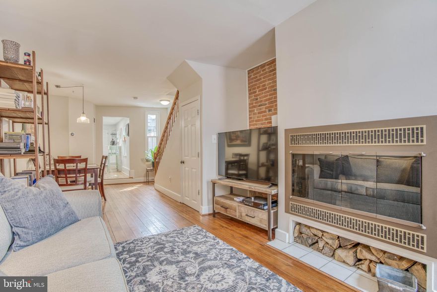 Welcome home to a well kept Fed Hill/Riverside townhome. This home has both original details and great new upgrades. On the main lever you'll find beautiful hardwood floors, an updated kitchen, a wood burning fireplace, main floor laundry, all wrapped up in an open floor plan.   Two upper levels each have a large bedroom and large bathroom with huge closets and a second floor office area.   All this plus a backyard and PARKING. Close to everything Federal Hill, Riverside, and Locust Point have to offer!