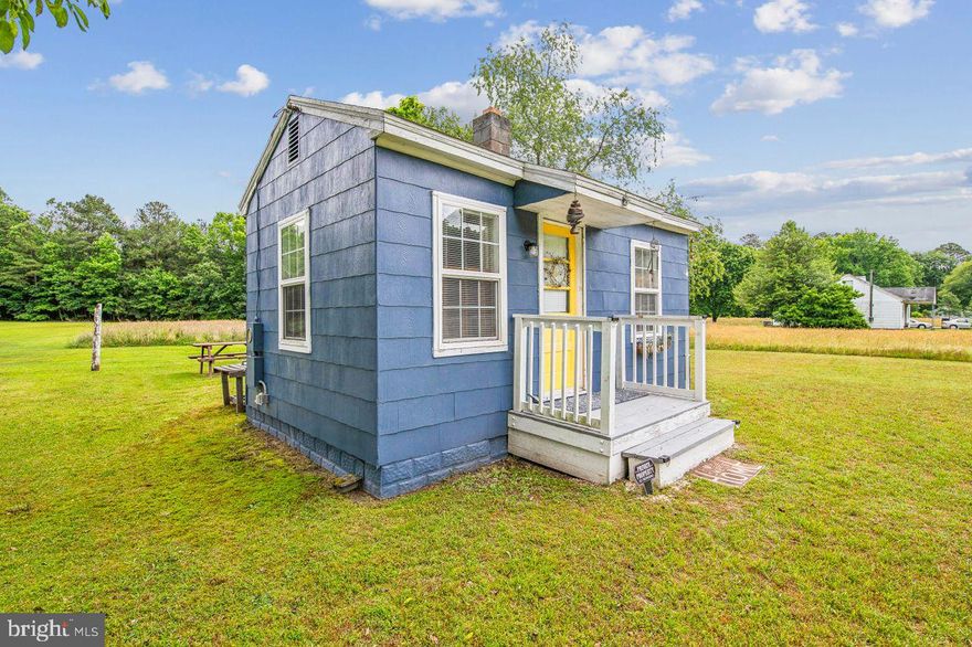 **We are in receipt of multiple offers - best and final offer deadline is Tuesday, 6/11, at 5 PM.** Welcome to 25322 Giles Lane, a charming tiny home perfect for a camping retreat, a serene getaway, or a hunter's lodge. Originally built in 1930, this unique home is brimming with character and has been lovingly restored by its current owner.  Updates within the last two years include windows, paint, and flooring, bringing a fresh feel to this historic gem. Nestled on a nearly half-acre lot, the property is beautifully maintained and bordered by trees, offering both privacy and a close connection to nature. A small shed provides extra storage space, and a picnic table invites you to enjoy outdoor dining and relaxation in this peaceful setting. The home also features updated electrical wiring with a 100-amp panel. While it is currently off-grid with the electrical service disconnected, this adds to the home's rustic charm and potential for a self-sufficient lifestyle. Please note, there is no well or septic system - the history of these utilities is unknown and the property is being sold AS-IS. The back of the property extends all the way to the tree line. Come and experience the unique appeal of this tiny home at 25322 Giles Lane, where simplicity meets character in a tranquil, natural setting .