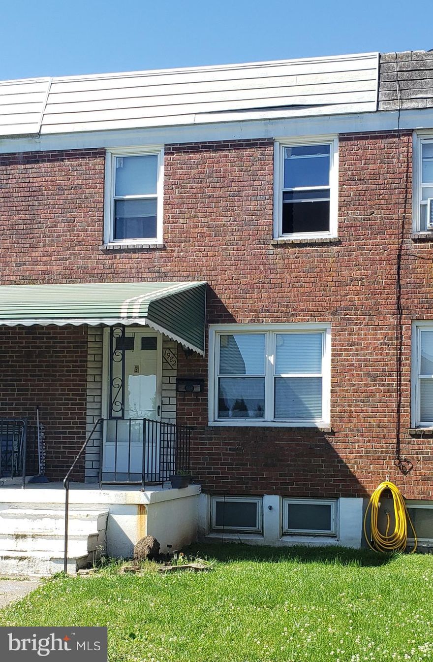 Whether you are looking for a GREAT INVESTMENT OPPORTUNITY or a home to buy LESS THAN RENT, this  rowhome just needs a little love and is in such a convenient location! Close to Merritt Park Shopping and tons of other stores and restaurants.  Easy access to downtown and major routes.  Perfect for an investor looking for a rental property or rehab opportunity needing just a bit of updating. (Owner last rented the property for $1,000 a month. ) OR WHY ARE YOU RENTING? You could purchase this home and the mortgage payment would be significantly less than rentals in the area.  Features include; hardwood floors throughout that just need a little shining, partially finished basement, HVAC and hot water heater have been replaced within the last 10 years, fenced rear yard. Property is priced to be sold as-is.  Seller will make no repairs however, inspections are welcome.  Look at the property values in the area! Similar renovated properties are selling 150K+. Grab it before it is gone!