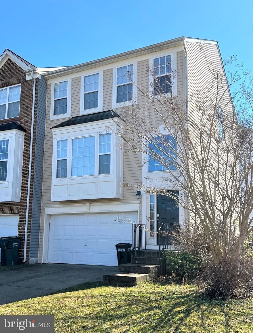 Beautifully Updated 2,508 Sq Ft End Unit Town Home Featuring Newer Stainless Steel Appliances, Updated Bathrooms, Hard Wood Flooring Throughout The Entire Home ! Spacious Fenced Rear Yard. 2 Car Garage, 3 Bedrooms On Upper Level, and Basement Could Be 4th . HVAC Replaced 1 Year Ago, Water Heater 3 Years Ago. Garage Door Recently Replaced Also. This Home Is A Winner !