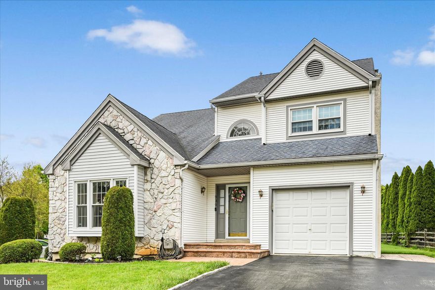 Rare opportunity to own a beautifully maintained 4-bedroom, 2.5-bath home in the highly desirable Bridgewater Development! A dramatic two-story foyer welcomes you into the stunning sunken living room featuring soaring cathedral ceilings. Flow seamlessly into the inviting dining room and updated eat-in kitchen, complete with abundant cabinetry, generous storage, and an oversized refrigerator.
The sunken family room offers a cozy gas fireplace and large window overlooking the backyard, creating the perfect gathering space. The first floor also features a convenient powder room, laundry area with oversized pantry storage room, and attached one-car garage.
Upstairs, the spacious primary suite includes a renovated bathroom and walk-in closet. Three additional bedrooms and an updated hall bath complete the second floor.
The fully finished basement provides exceptional additional living space, including a large storage/pantry area, office/movie room, sitting area, weight room/gym, and even more storage options.
Additional highlights include new staircase carpeting, paver entry, neutral decor, crown molding, hardwood flooring throughout the first and second floors, replacement windows, a new dishwasher, new laundry tub and a private tree-lined backyard with an expanded concrete patio perfect for outdoor entertaining and irrigation system.
Don’t miss your chance to make this exceptional property your new home!