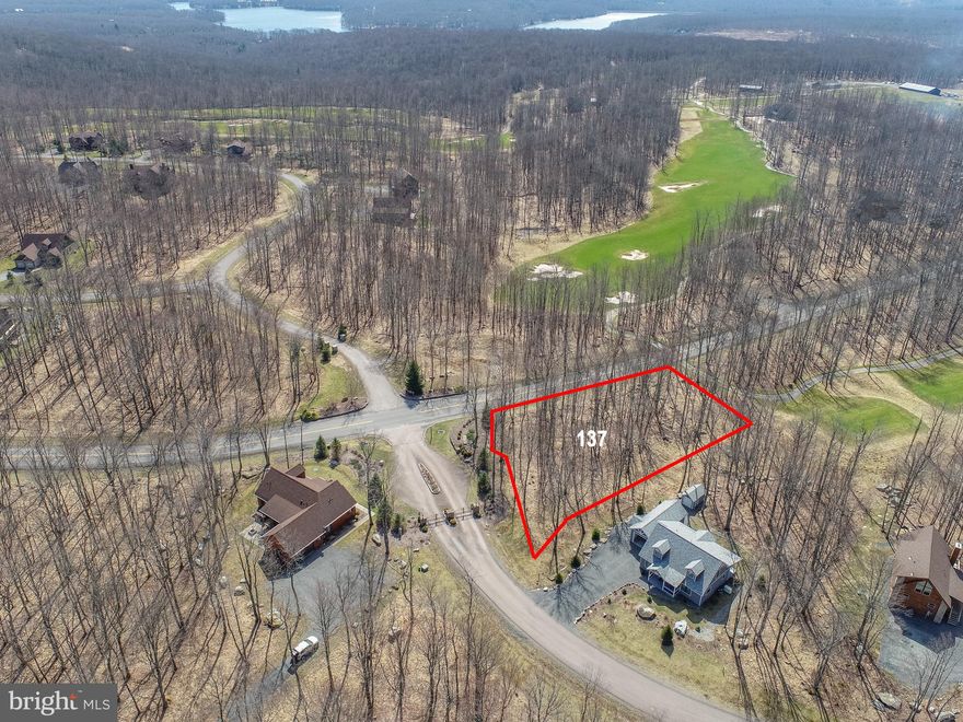 Beautiful Golf Front Building Lot on Lodestone Golf Course - Over half an acre of wooded land, centrally located just minutes from Local Restaurants, State Parks, Wisp Resort and Deep Creek Lake! All public utilities to site and ready to build on. Private lot situated right on the Tee Box of Hole 2 at Lodestone golf course, this property makes the perfect location for your future Mountain Lake Retreat... Call today for details!