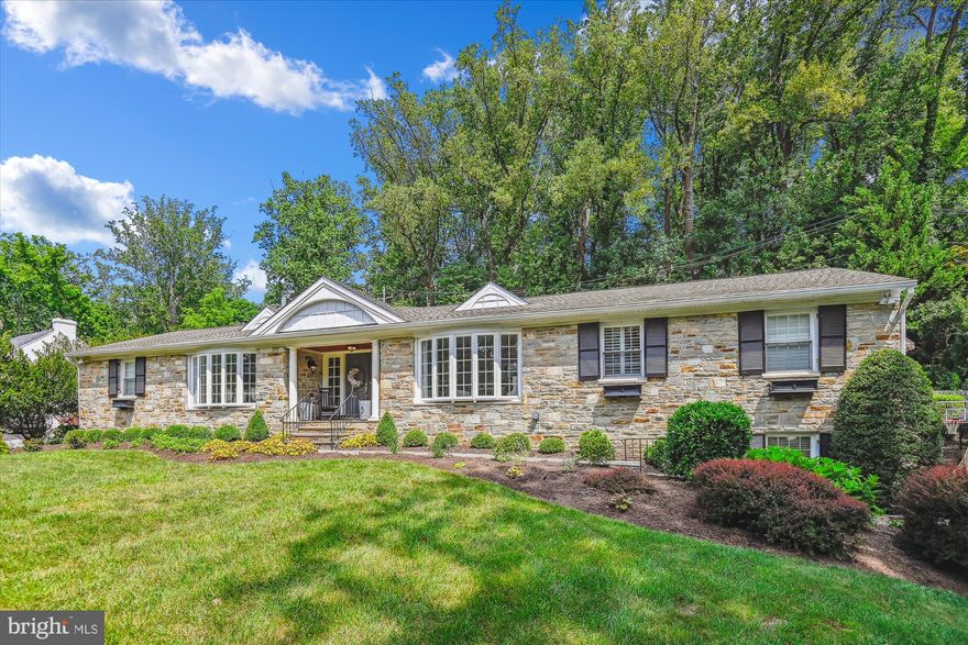 Nestled on a quiet cul-de-sac in one of Baltimore County’s most desirable communities, this stunning stone rancher offers the perfect balance of timeless construction, modern updates, and unbeatable location. Built with a solid cinder block frame and stone façade, this home is a reminder of an era when homes were built to last—you simply don’t see construction like this anymore.
With 4–5 bedrooms, 3 full baths, and 4,819 square feet of finished living space, the flexible layout adapts to any lifestyle. The main level features a sun-drenched family room with a cozy gas fireplace and sits adjacent to an eat-in kitchen with ample storage. The living and dining area is anchored by a striking wood-burning stone fireplace and bay window, allowing natural light to flood the space. A home office and the primary suite with generous closets are thoughtfully separated from the children’s wing, which includes three additional bedrooms.
The recently fully renovated and reimagined lower level has been transformed into a versatile living space—complete with mudroom and second laundry, a kitchenette, full bath, bedroom, two customized storage closets, and family room with its own beautiful wood-burning stone fireplace. Whether used as an au pair suite, guest quarters, or extra family space, this level adds flexibility and comfort

Step outside to your private retreat: a professionally landscaped yard with a heated saltwater pool, outdoor fireplace, and seating area—perfect for entertaining or unwinding. In the summer you can watch the fireflies light up the trees. 

Beyond the home, the Woodbrook community is truly exceptional and home to a collection of distinctive residences, including many multimillion-dollar estates, reflecting the prestige and enduring desirability of the neighborhood. With no HOA, private security, a book club, and a garden club, neighbors enjoy a close-knit atmosphere where block parties, neighborhood gatherings, and epic Halloween traditions are part of the charm. Walk to Lake Roland, a nature center, dog park, playgrounds, and hiking/biking trails, or grab a coffee at Starbucks, Dunkin’, or the local market—all just a few minutes’ walk away. Families will appreciate being zoned for two of Maryland’s top public schools and close to the best independent schools in the area. This is a neighborhood where convenience meets community, where the location is as much a part of the home’s value as the walls themselves.