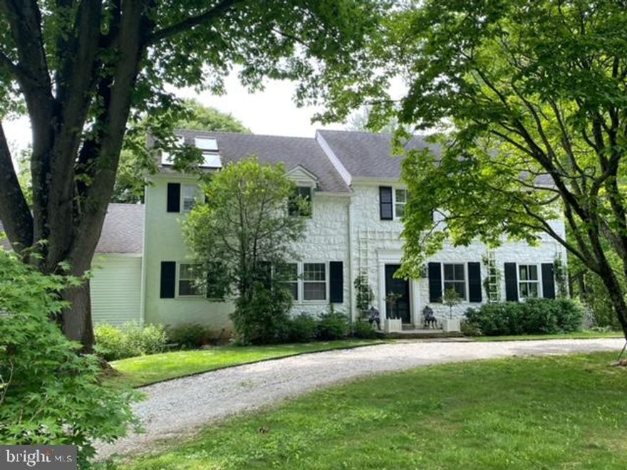 Move right into this beautiful two story, five bedrooms, 2.5 bathrooms in highly desirable Willistown Township with numerous renovations that have been made to this traditional center hall colonial home that has ample lighting and a modern farmhouse feel. The main level features a spacious Living Room and Dining Room. Custom built-in shelving, all natural WOCA Denmark finished flooring on the first floor. An eat-in kitchen connecting to mud, laundry room and private home office. The kitchen is complete with a large center island with a gas oven/stove, wood cabinetry, recessed lighting and large windows that overlook a private park like setting and access to the deck. The family room with a wood burning fireplace has floor to ceiling windows and french doors opening to flagstone terrace accessing 2.4 bucolic acres. The second floor consists of the primary bedroom with two large closets, full bath and ample storage. Four additional bedrooms, a hall bathroom and linen closet. A full finished basement has recessed lighting, separate exercise area and workshop with access to a two car garage with a TESLA charger. Should you be interested in expanding, this home offers countless possibilities. Close and convenient access to shopping, dining and train stations of Malvern and Paoli.