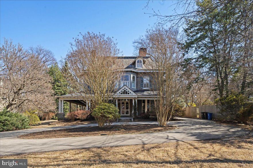 Welcome to 42 Summit Street with a handsome stone wall and circular driveway to greet you! This home, designed in an Italianate/Second Empire style circa 1863 by renowned surveyor and architect J.C. Sidney, was occupied  by prominent Chestnut Hillers the Heebner Family for 74 years! The home received a significant upgrade in 1887 when details were added like the glorious wraparound porch, inlaid and parquet flooring, a summer kitchen/butler pantry, and main bedroom suite. There are countless original details, including exquisite murals uncovered on many ceilings (with more for the next owners to uncover!), molding and woodwork, that make this home a true treat that unfolds before your eyes. Along with historic significance, you have a layout and updated kitchen renovation that are a necessity for everyday living. The home offers 11 ft ceilings, multiple fireplaces, and central air! On the first floor there is a large living room, sitting room, proper dining room, powder room with a 17th Century sink from Italy, and expanded kitchen. The current owners contracted this thoughtful kitchen renovation in 2016, which expanded the footprint, painstakingly restored some original cabinetry, and added new cabinets, Thermador and SubZero appliances, and glorious soapstone countertops and sink. Climb the beautiful, carved staircase to the second floor, home to the main bedroom suite. Updated by the current owners to include custom-painted French doors and numerous antique elements like Belgian paving tiles and decorative shower tiles. Three more nicely sized bedrooms and a full bathroom complete the second floor. On the third floor, there are three more bedrooms and a full bath(with cast iron clawfoot tub), giving you the option of spreading out to have a possible office, nanny suite, or to tuck your in-laws. Additional upgrades include a new roof on the 1st and 2nd levels(2022) and a new HVAC(2016, including conversion from oil to gas). Outdoor space abounds, where there is a flat side yard and nice backyard complete with a brick patio for your grill. (And for those interested in athletic karma, the backyard is currently a training site for a reigning World Champion) There are numerous trees in the yard including tulip magnolia, blue wisteria, and Japanese maple. You'll be 30 minutes to downtown Philadelphia or conveniently 2 turns to 309 to Trenton for the Amtrak train to NYC. You're just steps away from all Chestnut Hill has to offer with easy walkability to boutique shopping, fine dining and street festivals, Chestnut Hill Farmers Market, beautiful Wissahickon Valley Park, Chestnut Hill West AND East Regional Rail lines. A walkable and sublime lifestyle in every way. Don't miss your chance to live the life on Summit Street!