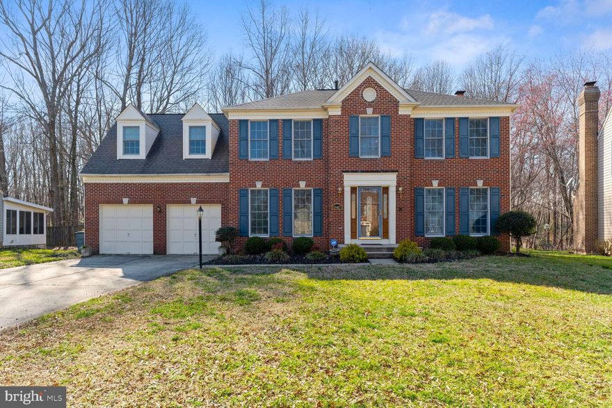 Impeccably kept brick front colonial with 4 bedrooms 3.5 bathrooms and 2 car garage in sought after Simmons Acres by Haverford Homes. You will be welcomed into the majestic two-story foyer flanked by the formal living and dining rooms. The main level has floor to ceiling windows and gleaming red oak hardwood floors.  Next is the huge kitchen with tons of counter space, prep island, upgraded granite counter tops, and table space with grand picture window that receives beautiful natural light. The kitchen opens to the expansive great room with brick fireplace to keep you cozy. It also opens to the tranquil fenced rear yard with deck and storage shed. Upstairs you will find the gorgeous primary bedroom with huge walk-in closet and bath suite including a beautiful skylight, tiled walk-in shower, soaking tub, and dual vanity.  The hall full bathroom also has a skylight and enlarged vanity.  The bedrooms have custom crown molding, and 3 bedrooms have custom chair rail molding. The lower level has been newly remodeled with fresh paint and tile floor and includes a recreation room with custom brick wet bar, full bathroom, office/hobby area, and partially finished laundry room with drop sink. Newer HVAC installed in 2019. Roof is 6 years old with 30 year Architectual shingles. The Simmons Acres neighborhood is complete with tennis courts and community outdoor pool for its residents.  You are going to love living here!