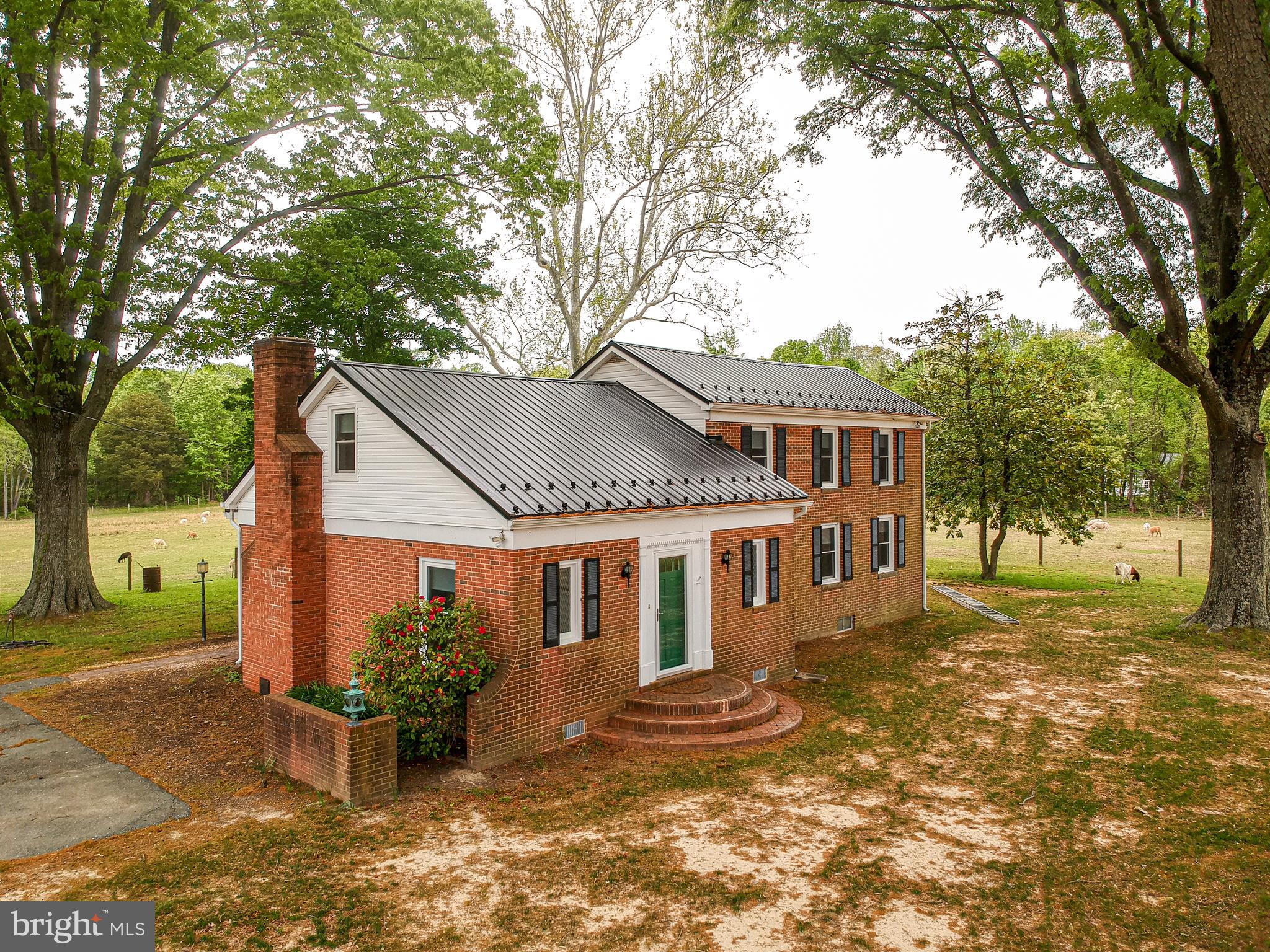 Recently Renovated Colonial Style 2-Story Brick 4 Bedroom/3 Bath Home Located in Country Setting Amongst Pastures and Working Fields. Home Features Stately Foyer, Spacious Living Room, Separate Dining Room w/ Custom Built-Ins, Enclosed Porch as well as a Covered Porch for Entertaining, Relaxing or Enjoying the Peaceful Rural Setting. Washer/Dryer Included. NO PETS or SMOKING.