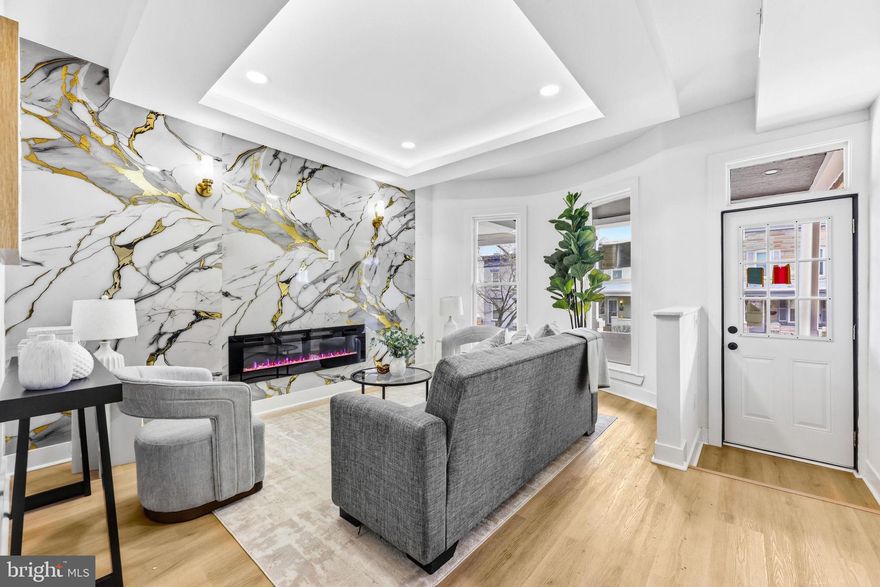 Discover Modern Living in the Heart of Hampden!
Welcome to your dream home in Baltimore's coolest, most lively neighborhood where colorful rowhomes meet indie shops, farm-to-table eateries, and that unmistakable "Charm City" vibe. Nestled right there is this fully renovated 3-bedroom, 3.5-bath townhome that has been transformed with city-approved permits and completely passed inspections for a necessary piece of mind. This home is move in ready with no surprises, just quality and style.
Brand New everything: New HVAC system, new roof, energy-efficient windows for lower utilities and year-round comfort.
The stunning, sleek, modern kitchen boasts stylish cabinetry, premium quartz countertops, stainless steel appliances, and is perfect for hosting friends or quiet weeknight dinners, do not forget the front porch to enjoy the summer weather.
The contemporary interior includes updated flooring, designer lighting, and thoughtful finishes throughout.
This spacious & flexible layout includes three generous bedrooms upstairs along with two full bathrooms + a convenient half bath for guests on the main floor. 
The finished lower level includes an extra full bathroom, making it ideal for a rec room, home office, gym, or guest suite — convert the extra living space to match your lifestyle!
No compromises on space or style in this light-filled, open feel in a classic Hampden rowhome

Live the Hampden Lifestyle You Crave:
Half a block from The Avenue (36th Street) with boutique shopping, quirky cafes, top-rated restaurants, and Mom's Organic Market for everyday essentials.
Minutes to Jones Falls Trail putting hiking, biking, and nature right outside your door.
Super convenient to Johns Hopkins University, major commuter routes, and quick access to downtown Baltimore.
This vibrant community is perfect for anyone who wants small town feel with big city energy.

This isn't just a house — it's your entry into one of Baltimore's most desirable, character-filled neighborhoods. Fully updated, thoughtfully designed, and perfectly located.
Ready to make it yours? 
Contact us to see this gem before it's gone. Your modern Hampden retreat awaits.