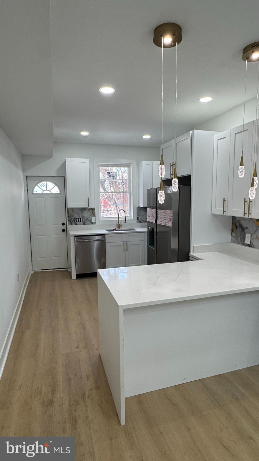 Discover Modern Living in the Heart of Hampden!
Welcome to your dream home in Baltimore's coolest, most lively neighborhood where colorful rowhomes meet indie shops, farm-to-table eateries, and that unmistakable "Charm City" vibe. Nestled right there is this fully renovated 3-bedroom, 3.5-bath townhome that has been transformed with city-approved permits and completely passed inspections for a necessary piece of mind. This home is move in ready with no surprises, just quality and style.
Brand New everything: New HVAC system, new roof, energy-efficient windows for lower utilities and year-round comfort.
The stunning, sleek, modern kitchen boasts stylish cabinetry, premium quartz countertops, stainless steel appliances, and is perfect for hosting friends or quiet weeknight dinners, do not forget the front porch to enjoy the summer weather.
The contemporary interior includes updated flooring, designer lighting, and thoughtful finishes throughout.
This spacious & flexible layout includes three generous bedrooms upstairs along with two full bathrooms + a convenient half bath for guests on the main floor. 
The finished lower level includes an extra full bathroom, making it ideal for a rec room, home office, gym, or guest suite — convert the extra living space to match your lifestyle!
No compromises on space or style in this light-filled, open feel in a classic Hampden rowhome

Live the Hampden Lifestyle You Crave:
Half a block from The Avenue (36th Street) with boutique shopping, quirky cafes, top-rated restaurants, and Mom's Organic Market for everyday essentials.
Minutes to Jones Falls Trail putting hiking, biking, and nature right outside your door.
Super convenient to Johns Hopkins University, major commuter routes, and quick access to downtown Baltimore.
This vibrant community is perfect for anyone who wants small town feel with big city energy.

This isn't just a house — it's your entry into one of Baltimore's most desirable, character-filled neighborhoods. Fully updated, thoughtfully designed, and perfectly located.
Ready to make it yours? 
Contact us to see this gem before it's gone. Your modern Hampden retreat awaits.