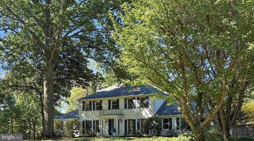 Nestled on a quiet street and set on a beautifully landscaped 1.5-acre corner lot, this classic Colonial offers timeless architecture and exceptional space for living and entertaining. From the moment you arrive, you’ll notice the striking architectural details thoughtfully crafted by the original builder.

Inside, the home features the grand, banquet-sized rooms expected in a luxury residence, along with unique bonus spaces that add flexibility and charm. A private office just off the family room provides the perfect space for working from home or a quiet retreat.

The kitchen is designed for both everyday living and entertaining, with expansive prep areas, stainless steel appliances, quartz countertops, and custom cabinetry. The open layout connects the kitchen, family room, and casual dining area, all with easy access to the back deck and the large fenced yard.

Outdoor living is just as impressive, with extensive landscaping, generous decking, a storage shed, and an in-ground concrete pool—creating the perfect setting for gatherings or peaceful relaxation.

The upper level features four spacious bedrooms with ample closet space. The fully finished lower level offers incredible versatility, including a potential fifth bedroom, a separate full bath, a second kitchen, and flexible space for a gym, recreation, or additional entertaining, with convenient walkout access. This level could also function beautifully as a private in-law suite or multigenerational living space.

Nature lovers will appreciate the private, park-like setting with an abundance of fruit trees and plantings, including persimmon trees, a fig tree, and blueberry bushes, grapes, peaches, blackberries and roses adding beauty and seasonal harvests to this tranquil outdoor oasis. Stunning sunset views to enjoy every evening. 

Recent updates include kitchen renovation, newer roof, new windows, gutters, siding, garage doors, garage expansion. Laundry is conveniently located on the main level. Enjoy the peaceful sights and sounds of nature while relaxing in this truly special property that offers privacy, comfort, and exceptional entertaining spaces.