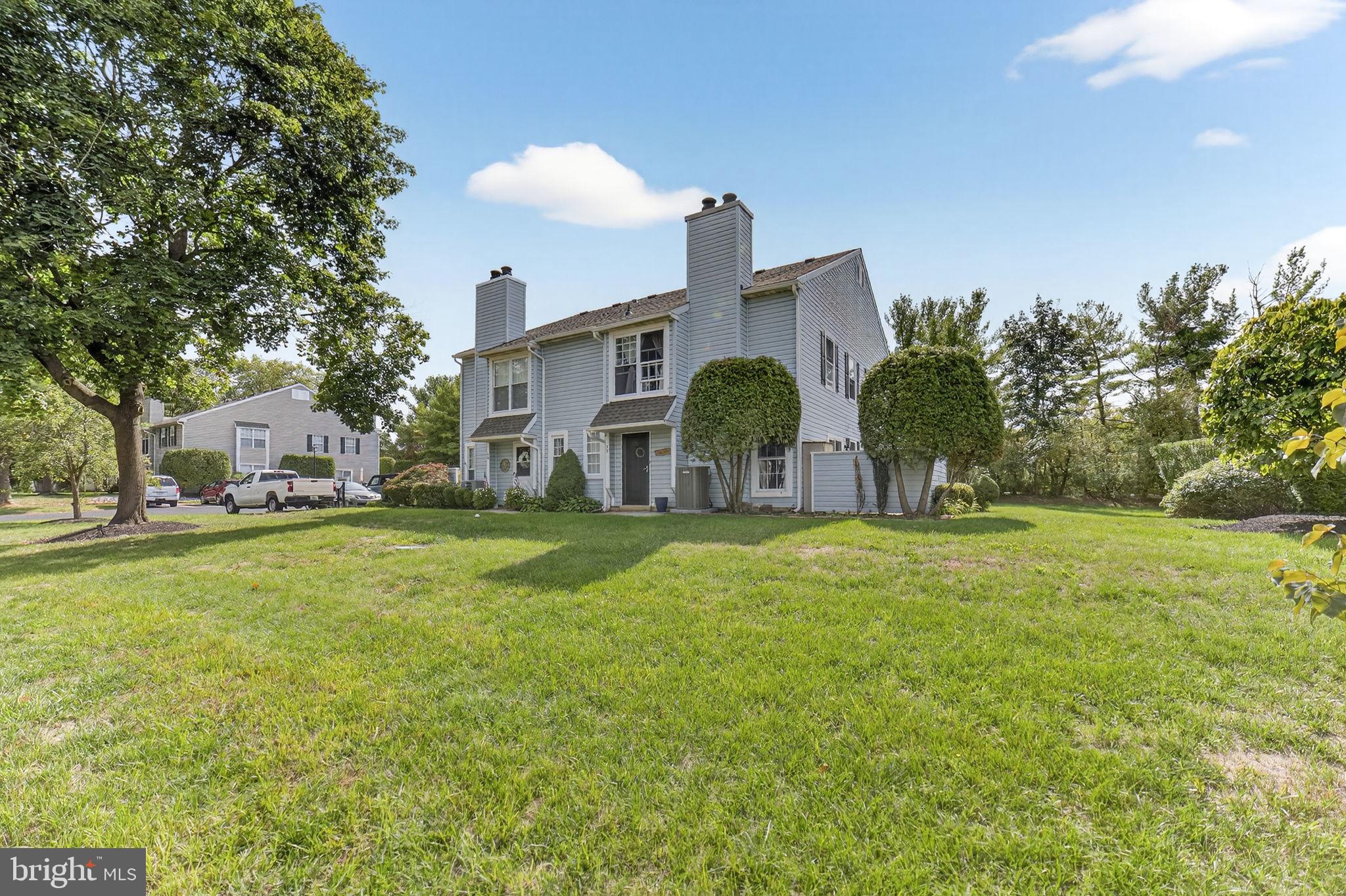 Located in the desirable Yorkshire Meadows community, this ground-level two-bedroom, two-bath condo offers a bright open floor plan with inviting features. The kitchen is appointed with granite countertops, while hardwood floors flow throughout the living space. A cozy wood-burning fireplace enhances the living/dining room, and sliding glass doors lead to a private deck—perfect for seasonal entertaining.The unit includes two convenient parking spaces and provides an opportunity to add your personal touch with a little fresh paint. Yorkshire Meadows offers a peaceful setting with mature landscaping, just off the main road. You’ll enjoy the convenience of being within walking distance to restaurants, grocery stores, retail shops, and the NYC bus line. The location is unbeatable—only 5 minutes to New Hope, 50 minutes to Philadelphia, and about an hour to New York City.