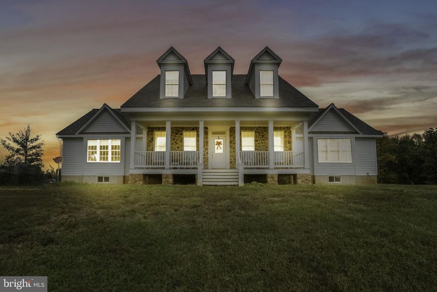 Country Retreat with City Conveniences  near the charming town of Culpeper!  Commuting routes, schools, shopping, restaurants and medical facilities are MINUTES away! This beautiful home sits on 10 acres surrounded by pastures and breathtaking vistas!  The foothills of the Blue Ridge Mountains, Washington DC, award winning restaurants, vineyards, orchards and skyline drive are within an 1.5 hour drive!  This beautiful Cape Cod style home boasts 4 bedrooms and 3 baths and beautiful moldings throughout.  Enjoy main level living with the Master retreat and a secondary bedroom located on the first floor!  Gleaming hardwood floors throughout this home.  Two additional bedrooms with a Jack-n-Jill bath are on the second level which overlooks the Great Room.  Need a big space for entertaining?  The 20 X 22 ft. gourmet kitchen is complete with stainless appliances, built-ins, a large island and table space.  The formal Dining Room adjoins the kitchen for more gatherings!  The  26 x 20 ft Great Room has a soaring two-story ceiling which lets in plenty of natural light! Enjoy a morning or evening  beverage from the covered front or back porches where you can't help but relax!  If you desire more space, the unfinished basement (2400+ sq ft) is just waiting for you to put the finishing touches on. The property even has a chicken coop so that farm-fresh eggs can be enjoyed daily!  This beautiful property can be yours to enjoy the upcoming holidays!